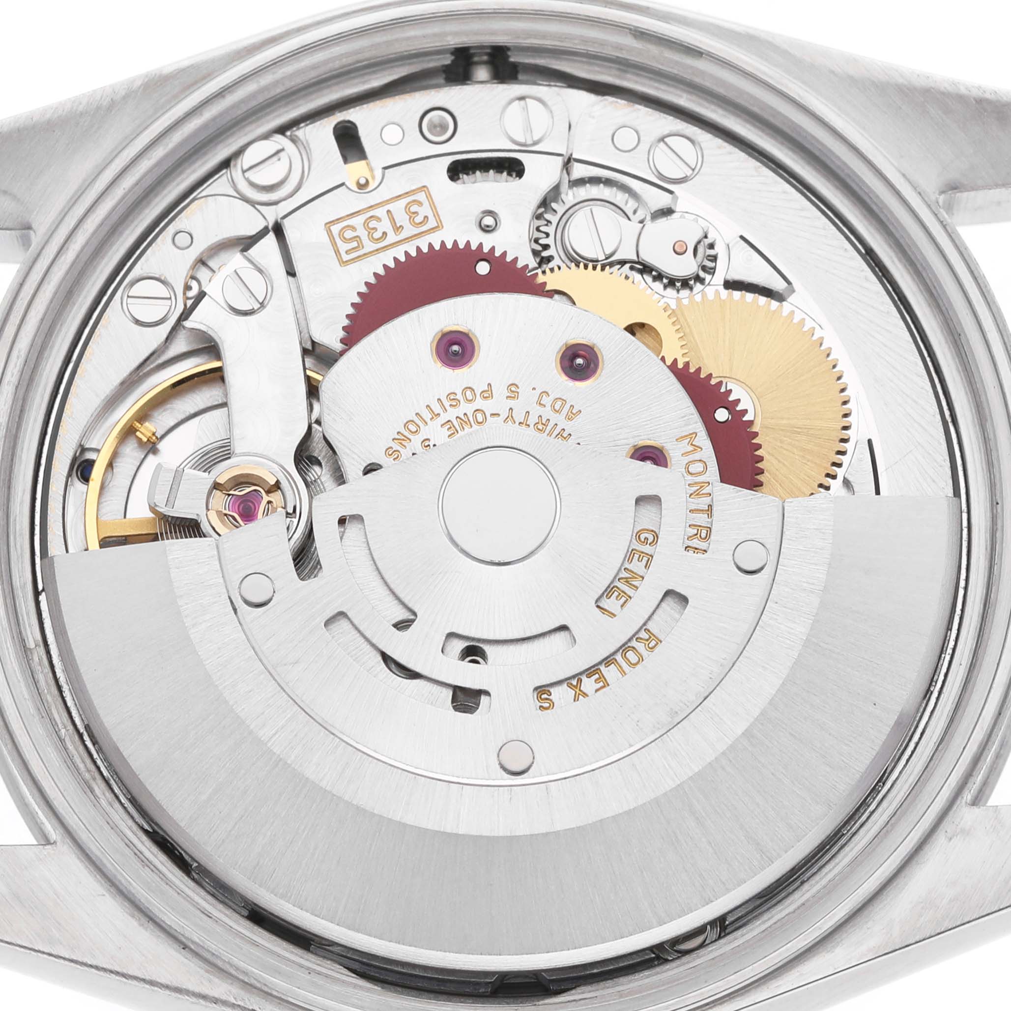 The image shows the intricate movement mechanism of a Rolex Date 15200 Men's Stainless Steel Silver Dial watch, viewed from the back.