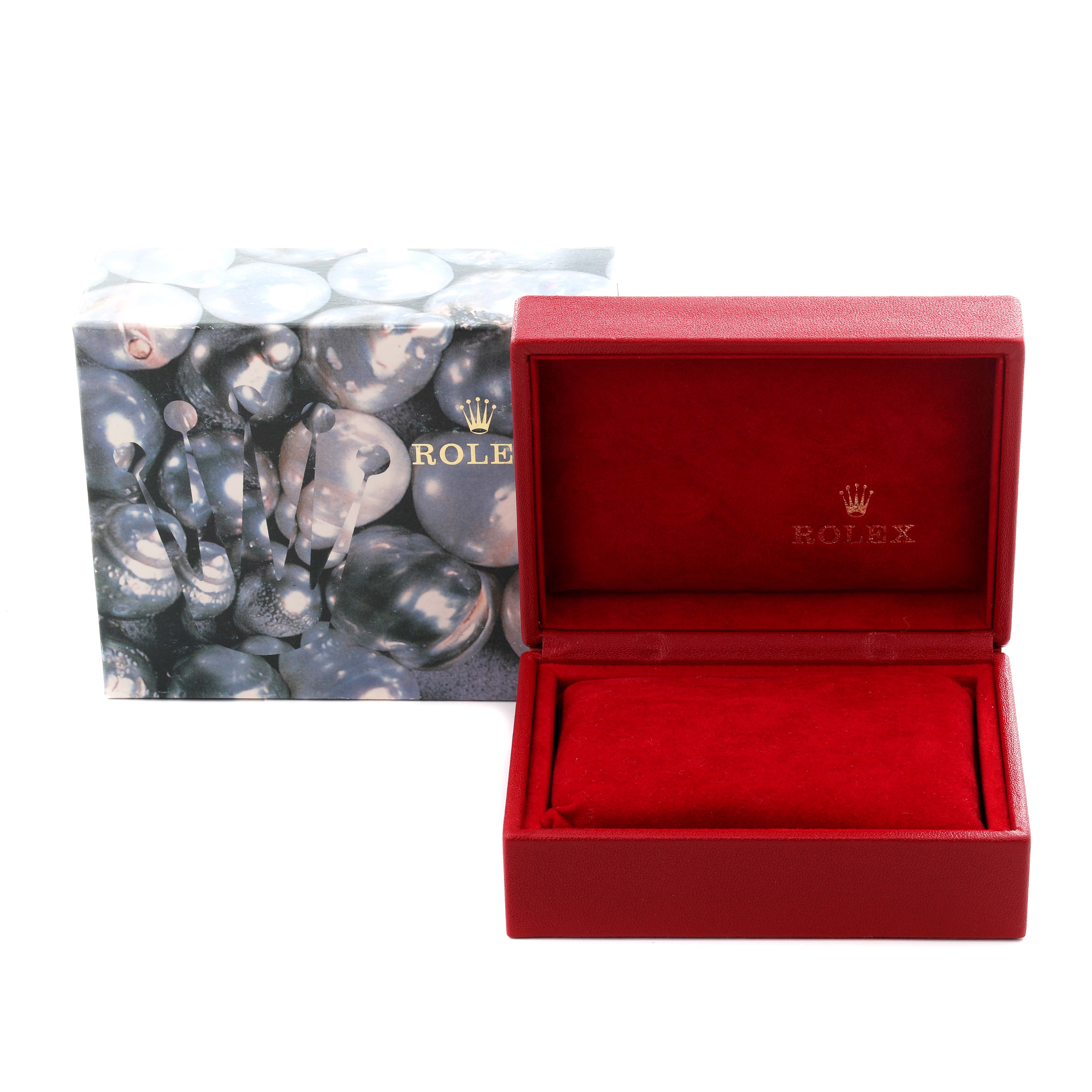 The image shows a Rolex Oyster Perpetual 67193 Women's Steel and Gold (two tone) Champagne Dial 67193 Women's Steel and Gold (two tone) Champagne Dial watch box with a red interior and an outer decorative box featuring pearl-like patterns.