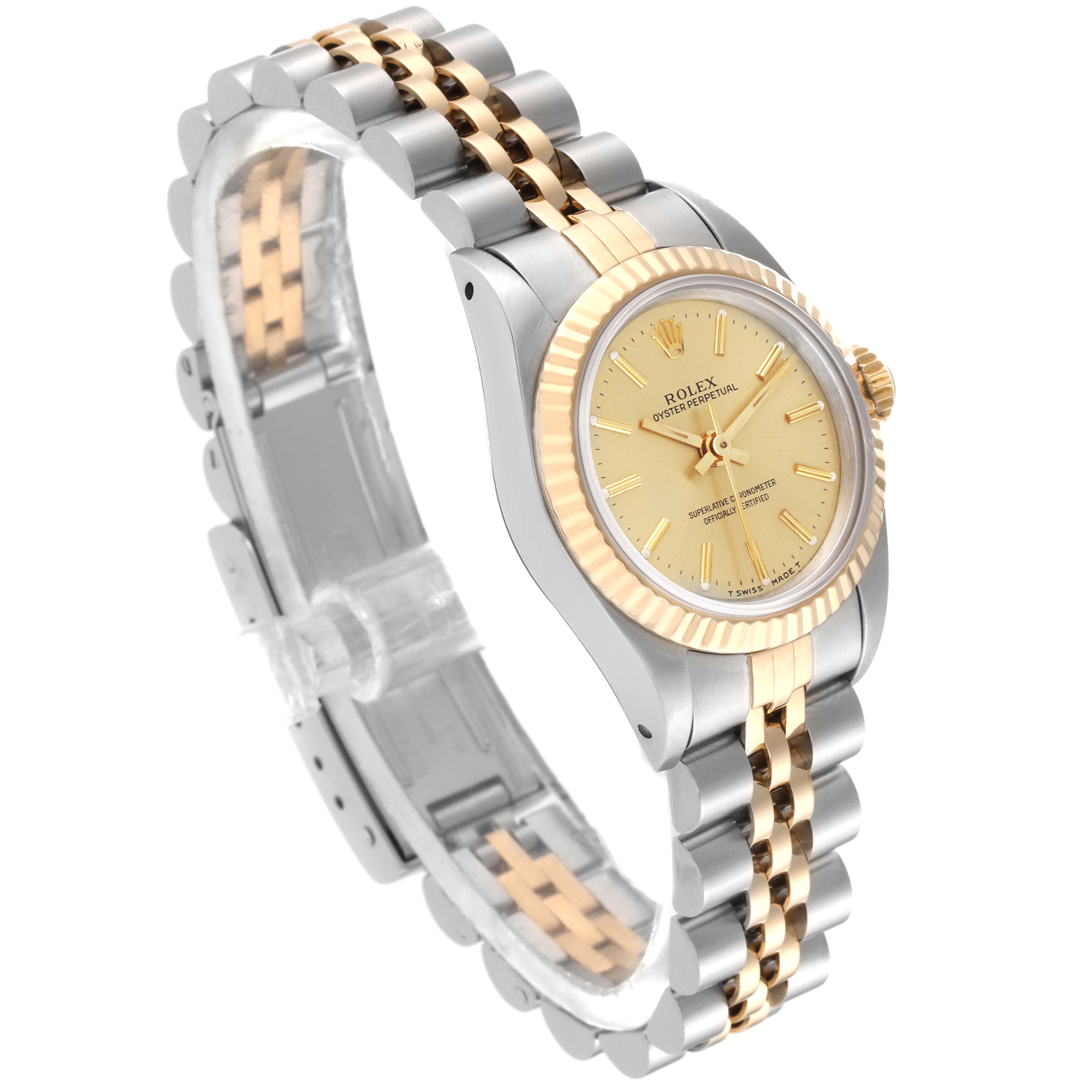 The Rolex Oyster Perpetual 67193 Women's Steel and Gold (two tone) Champagne Dial 67193 Women's Steel and Gold (two tone) Champagne Dial watch is shown at a three-quarter angle, highlighting the dial, bezel, and two-tone bracelet.