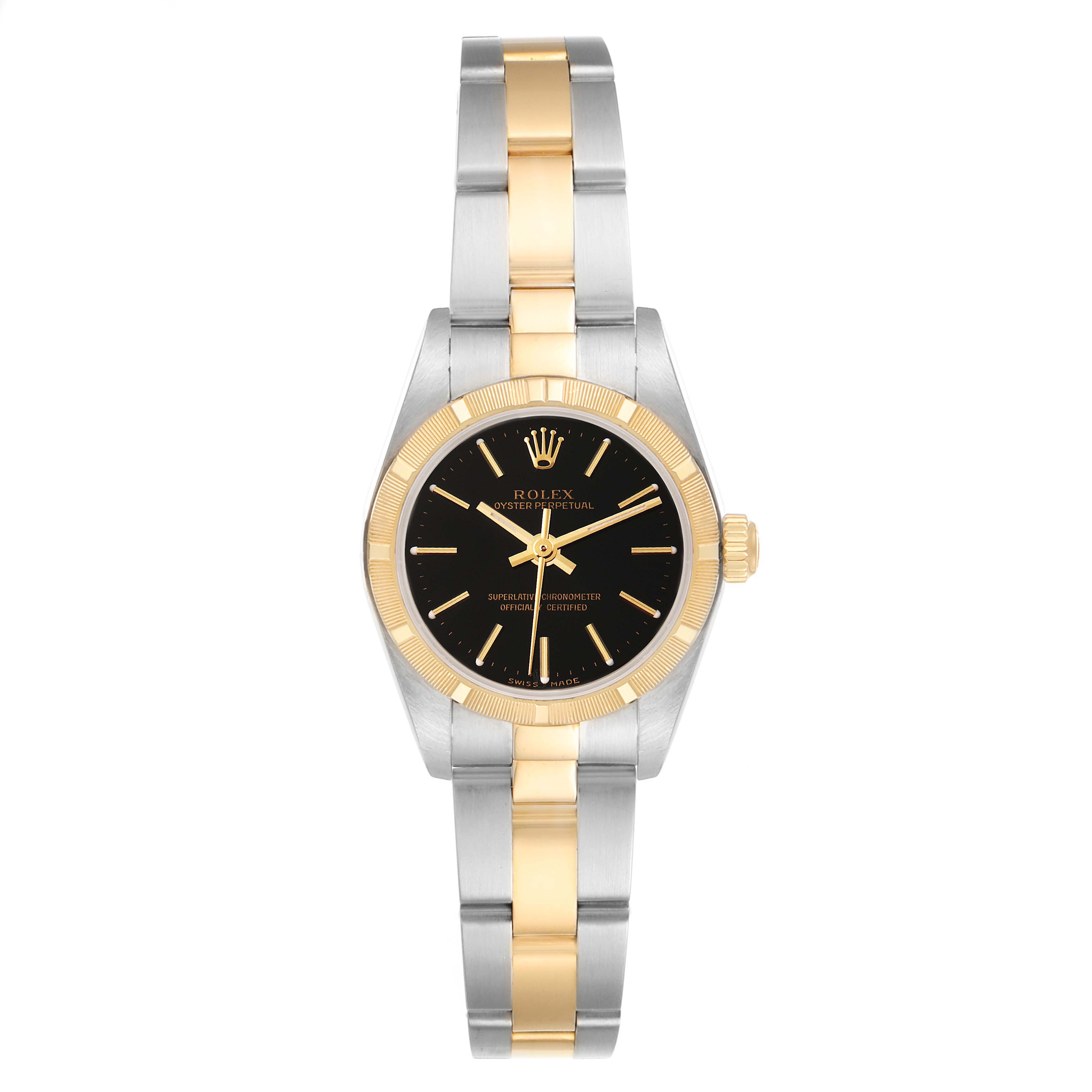 This is a front view of the Rolex Oyster Perpetual 76233 Women's Steel and Gold (two tone) Black Dial 76233 Women's Steel and Gold (two tone) Black Dial watch, displaying its black dial, gold bezel, and two-tone bracelet.