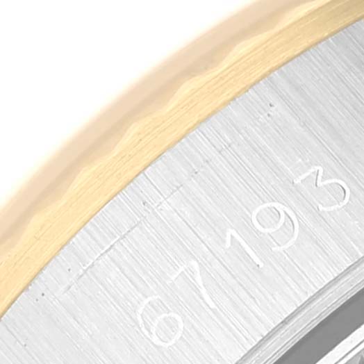 This image shows a close-up of the case side with the model number "67193" of the Rolex Oyster Perpetual 67193 Women's Steel and Gold (two tone) Silver Dial 67193 Women's Steel and Gold (two tone) Silver Dial watch.