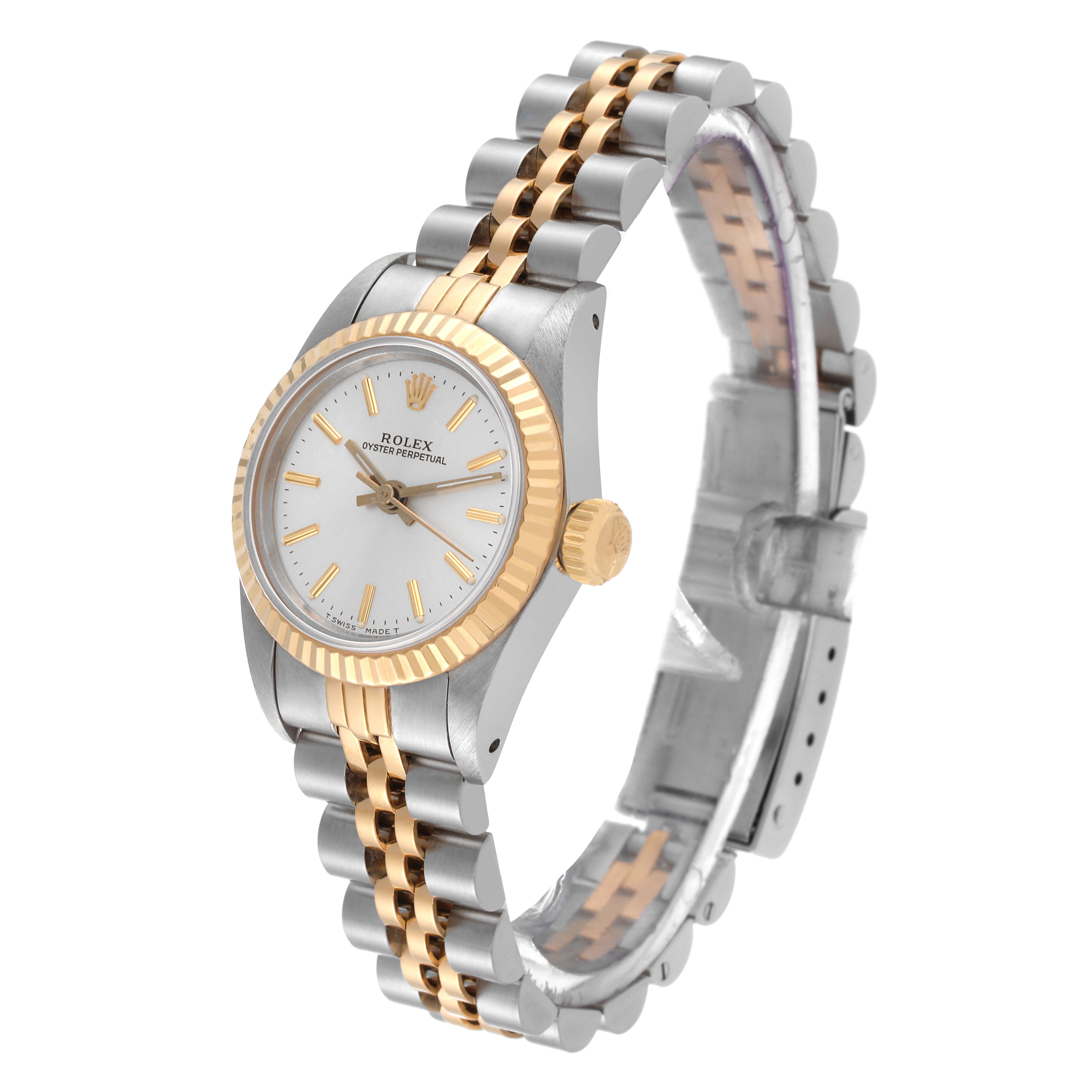 The image shows a side angle of a Rolex Oyster Perpetual 67193 Women's Steel and Gold (two tone) Silver Dial 67193 Women's Steel and Gold (two tone) Silver Dial watch, highlighting its dial, bezel, crown, and Jubilee bracelet.