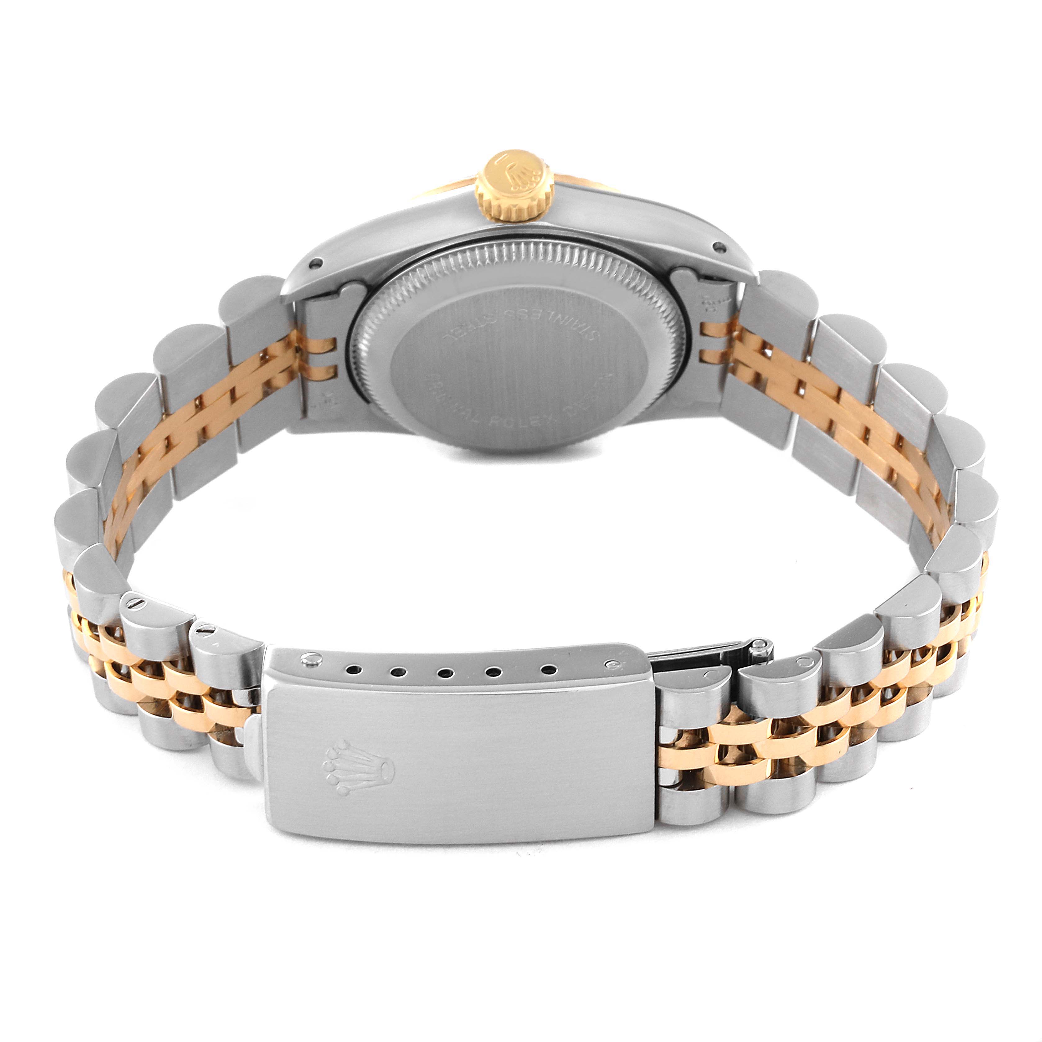 The image shows the back of a Rolex Oyster Perpetual 67193 Women's Steel and Gold (two tone) Silver Dial 67193 Women's Steel and Gold (two tone) Silver Dial watch, highlighting the case back, crown, and two-tone bracelet with clasp.