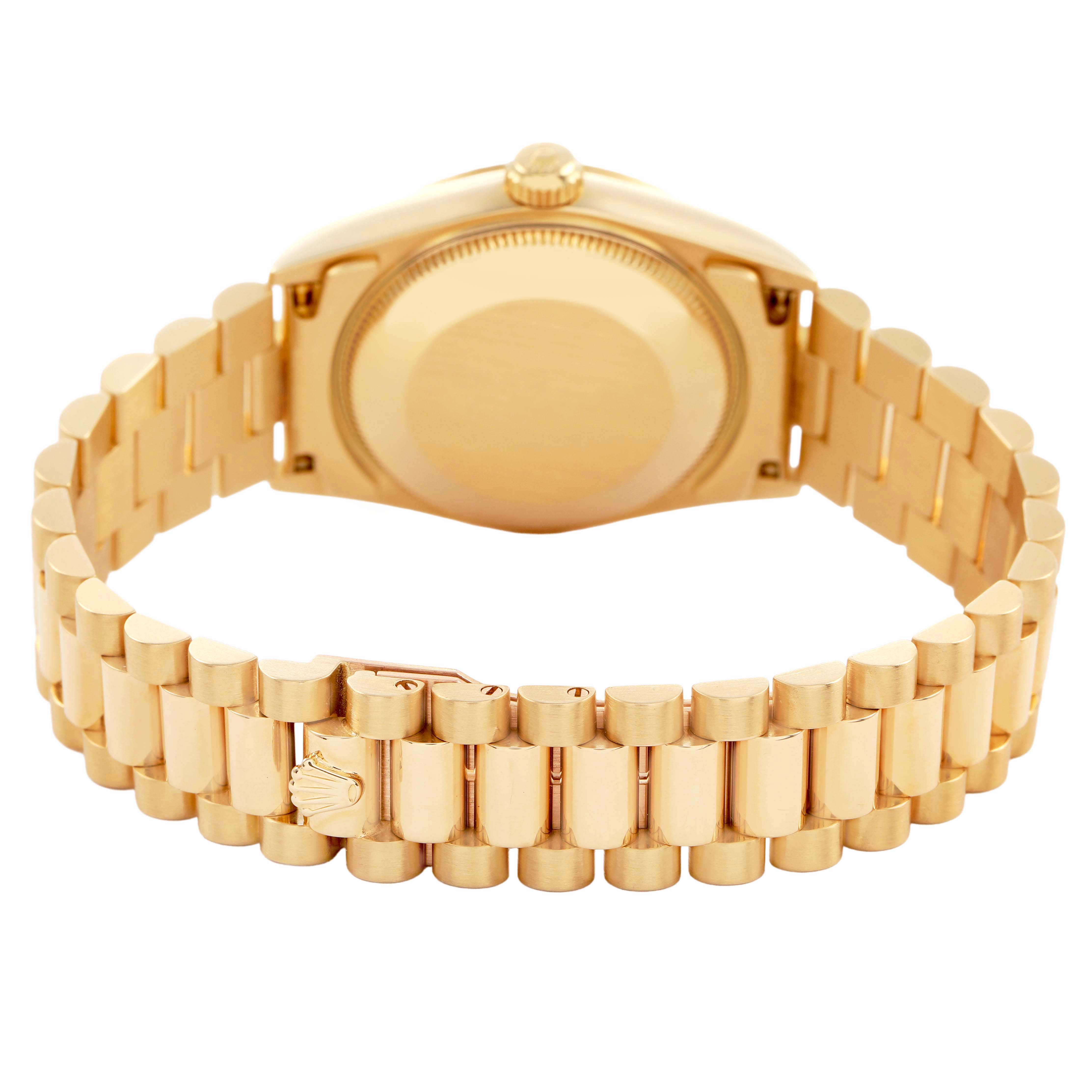 The Rolex President 68278 Women's Yellow Gold Blue Dial model is shown from the back, highlighting the bracelet and case, with a focus on the crown and clasp.