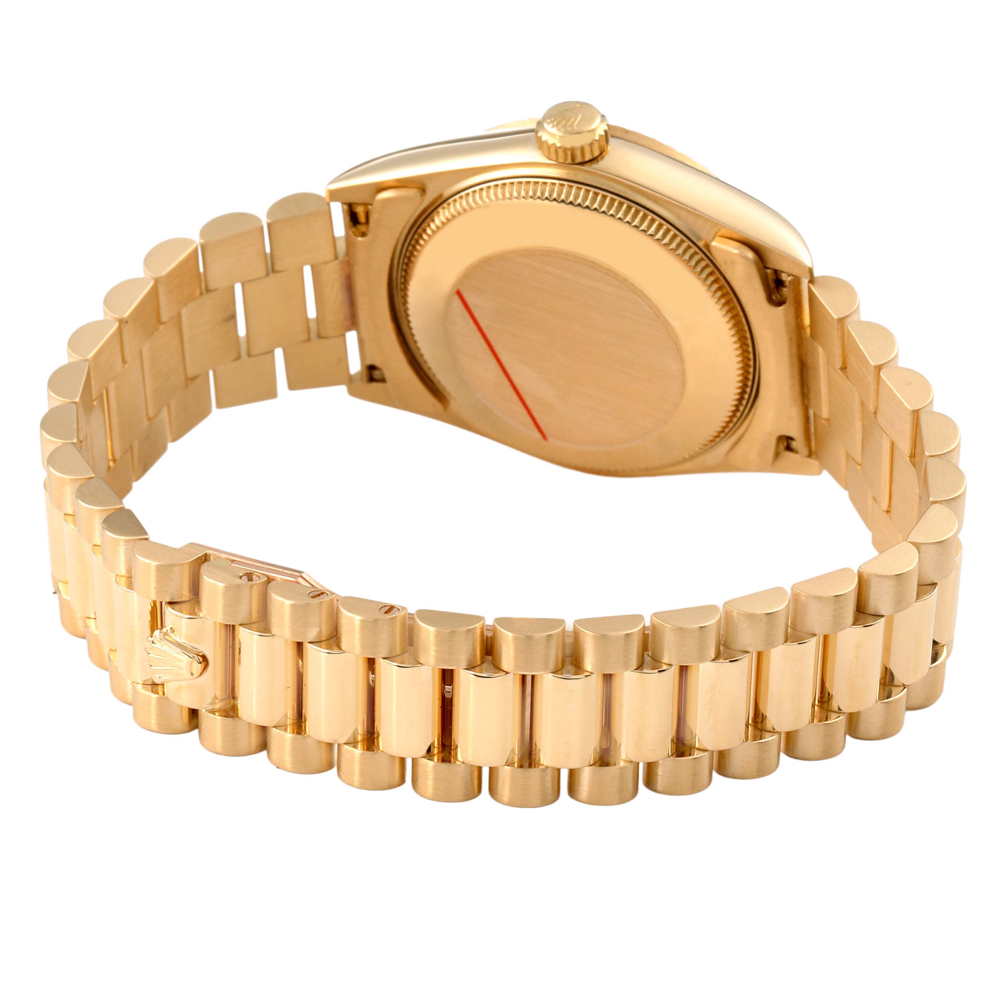 The image shows the backside and bracelet of the Rolex President 68278 Women's Yellow Gold Blue Dial model, highlighting the clasp and case back.