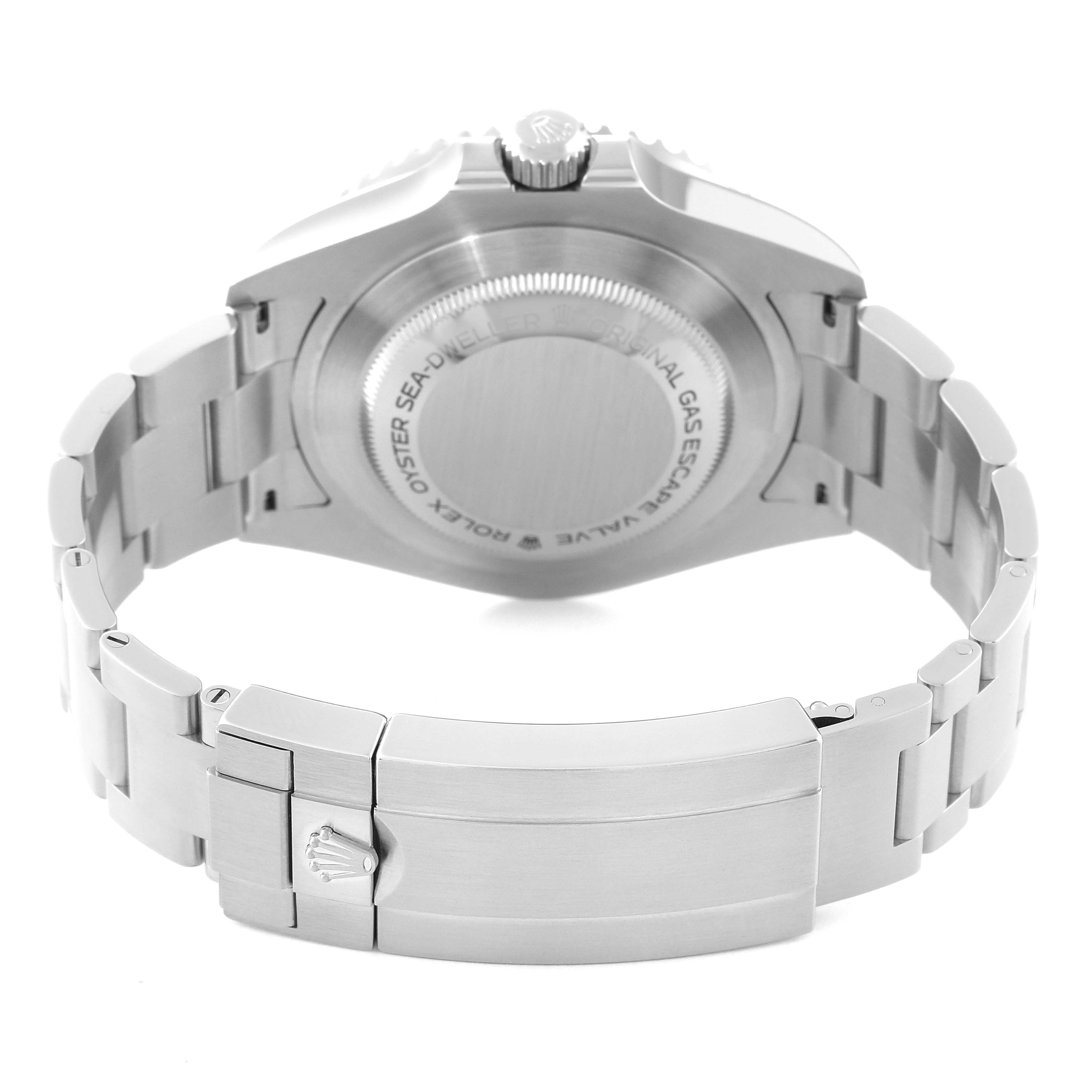 The image shows the back view of a Rolex Sea-Dweller 126600 Men
s Stainless Steel Black Dial 126600 Men
s Stainless Steel Black Dial watch, highlighting its case back, crown, and metal bracelet clasp.