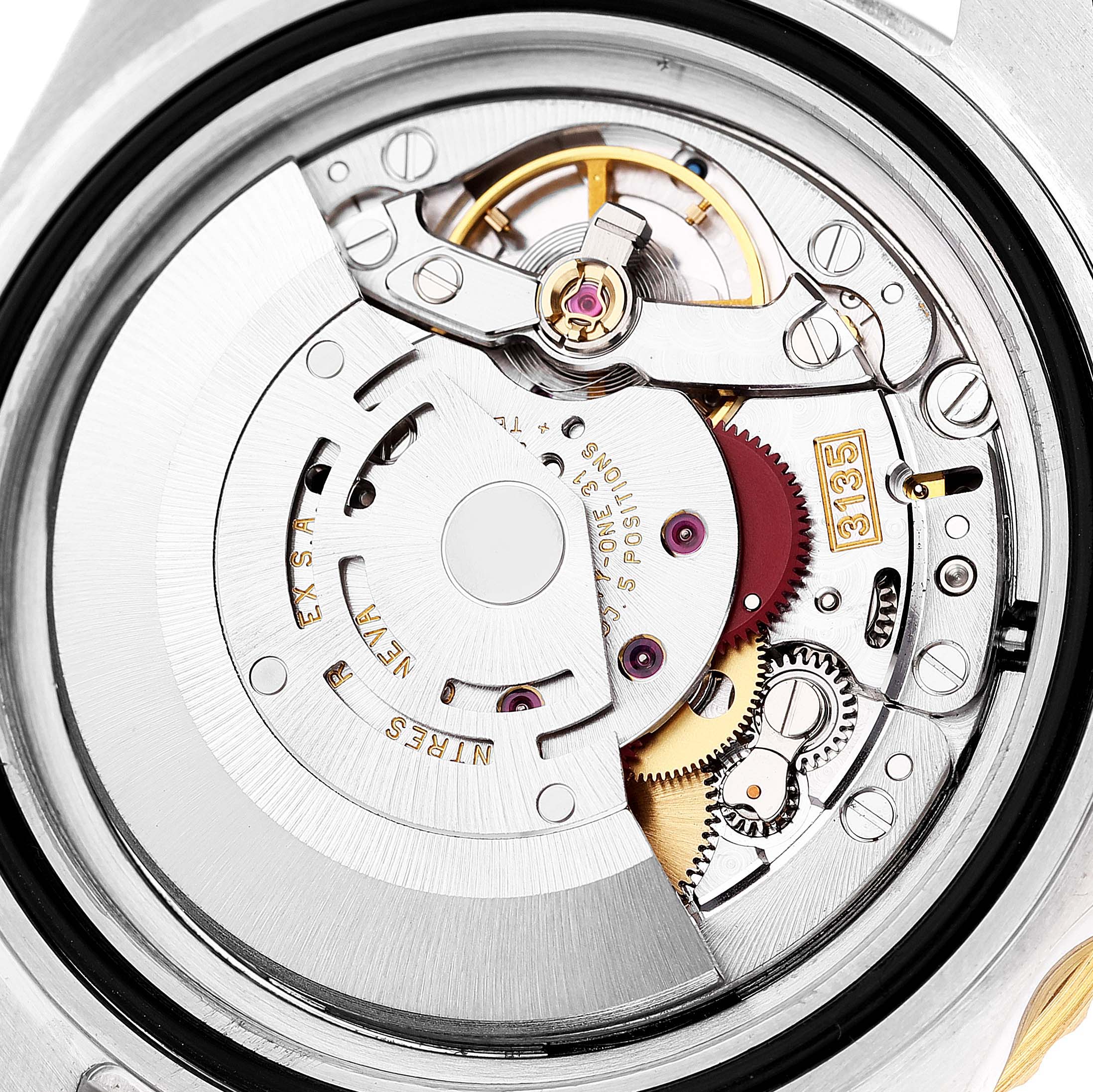 This image shows the intricate internal mechanism of a Rolex Submariner 16613 Men's Steel and Gold (two tone) Blue Dial 16613 Men's Steel and Gold (two tone) Blue Dial watch from a close-up, back angle.