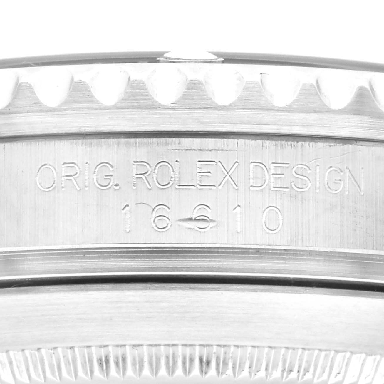 This image shows a close-up of the side engraving on the bezel of a Rolex Submariner 16610 Men
s Stainless Steel Black Dial 16610 Men
s Stainless Steel Black Dial watch, featuring the model number 16610.