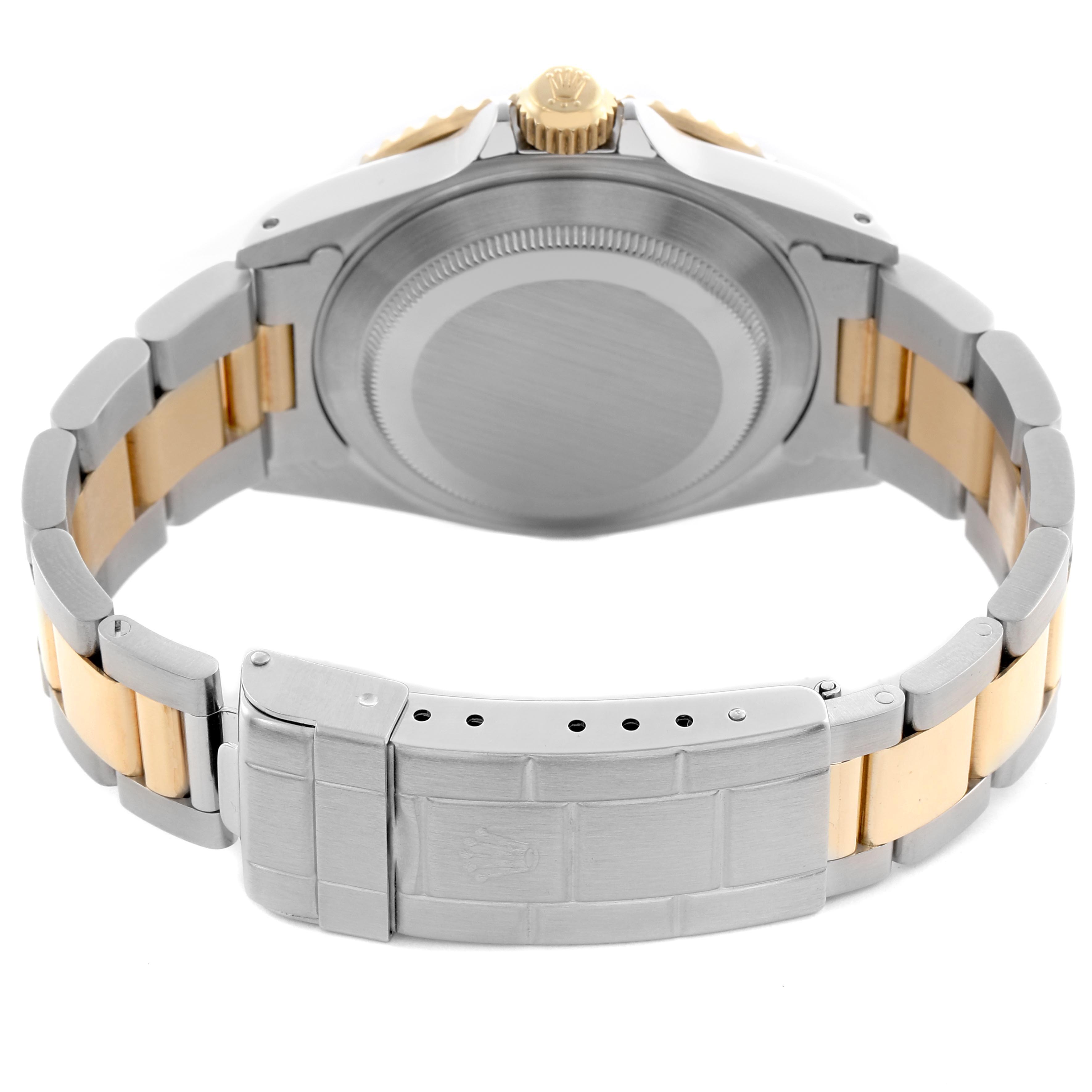 The Rolex Submariner 16613 Men's Steel and Gold (two tone) Black Dial 16613 Men's Steel and Gold (two tone) Black Dial is shown from the back, displaying the case, crown, and oyster bracelet clasp.