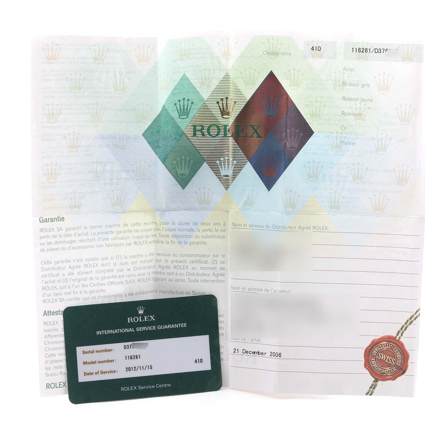 The image shows a warranty card and certificate for a Rolex Turn-o-Graph 116261 Men's Steel and Gold (two tone) White Dial 116261 Men's Steel and Gold (two tone) White Dial watch.