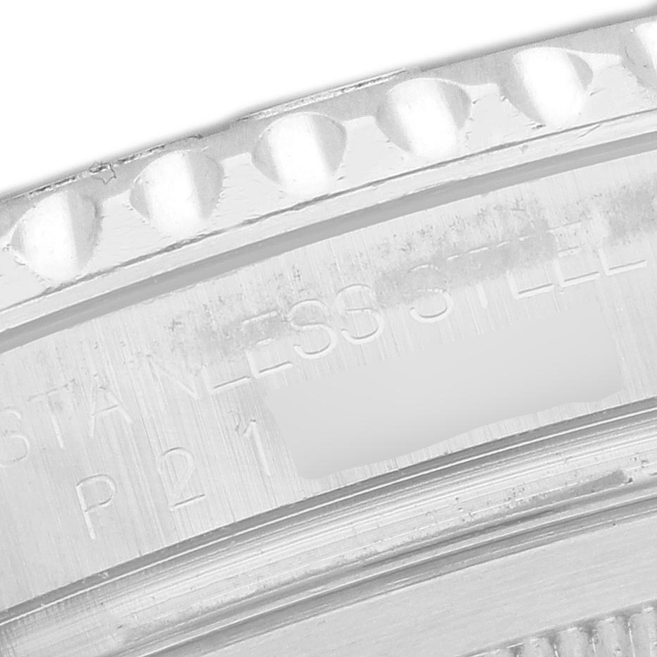 The image shows a close-up of the Rolex Yacht-Master 16622 Men
s Stainless Steel Silver Dial 16622 Men
s Stainless Steel Silver Dial
s engraved details on the stainless steel case back.