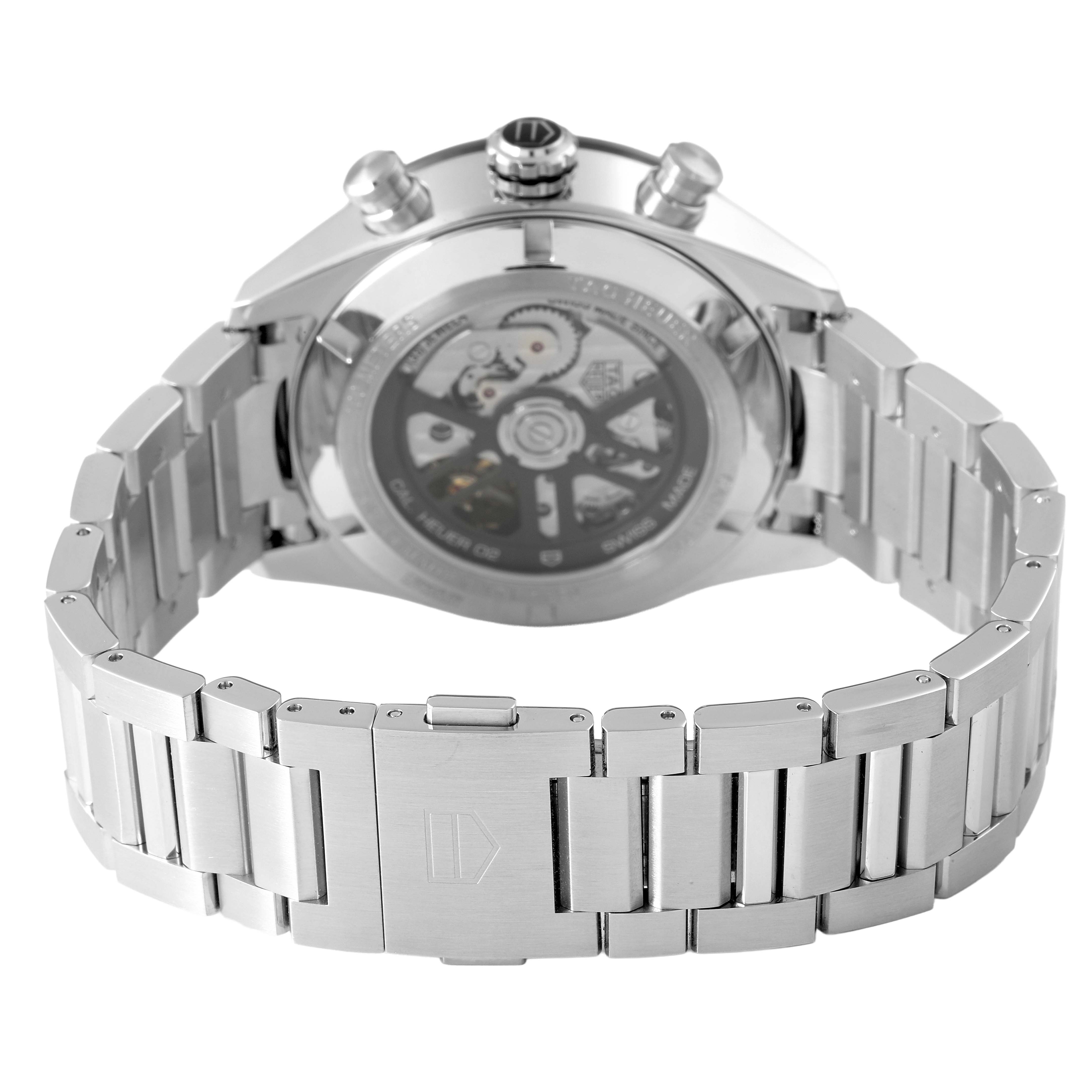 The Tag Heuer Carrera CBN2A1N.BA0643 Men's Stainless Steel Green Dial watch is shown from the back, highlighting its transparent case back and stainless steel bracelet.