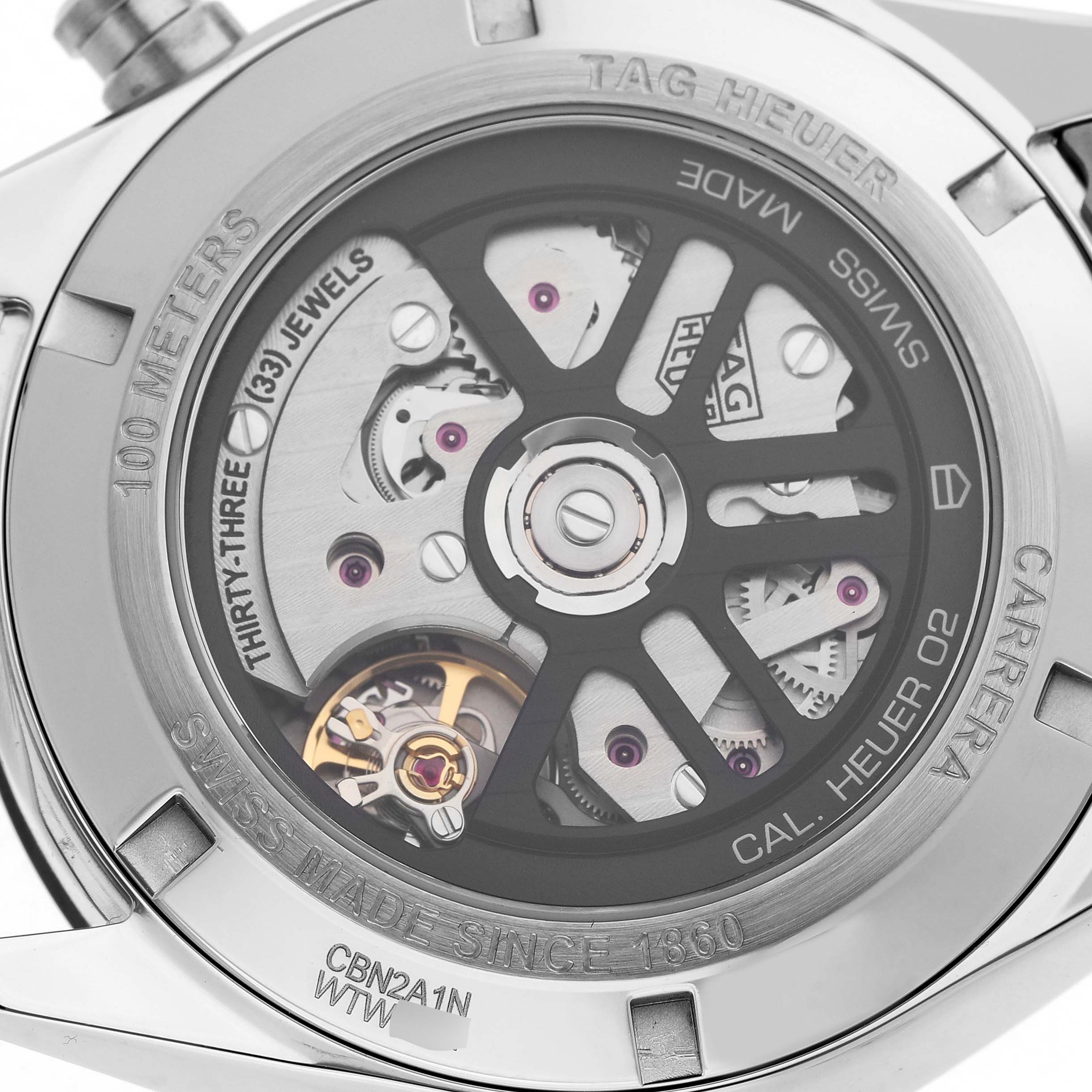 This image shows the back view of the Tag Heuer Carrera CBN2A1N.BA0643 Men's Stainless Steel Green Dial watch, revealing the movement and inner mechanisms.