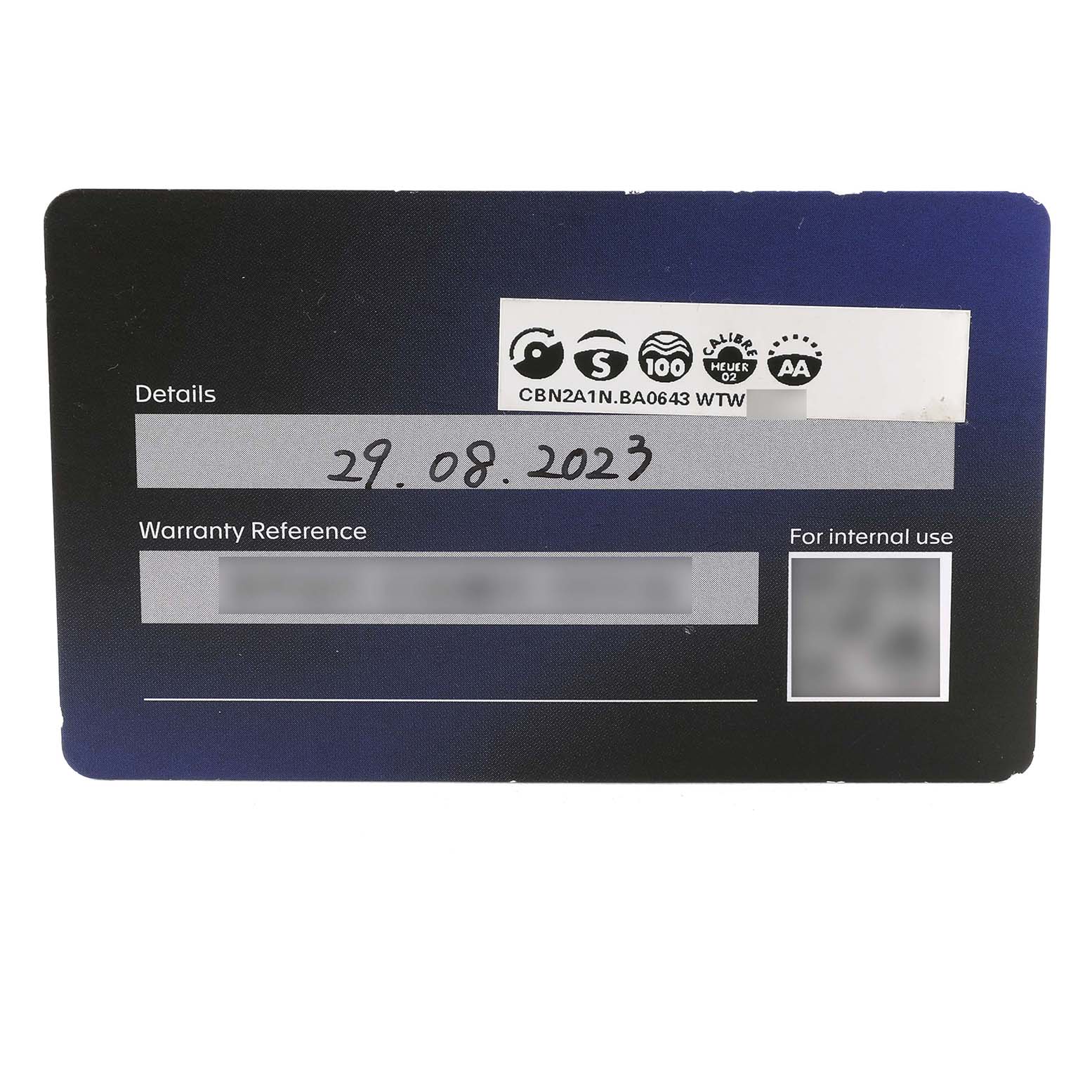 The image shows a warranty card for a Tag Heuer Carrera CBN2A1N.BA0643 Men's Stainless Steel Green Dial watch, including details and warranty reference.