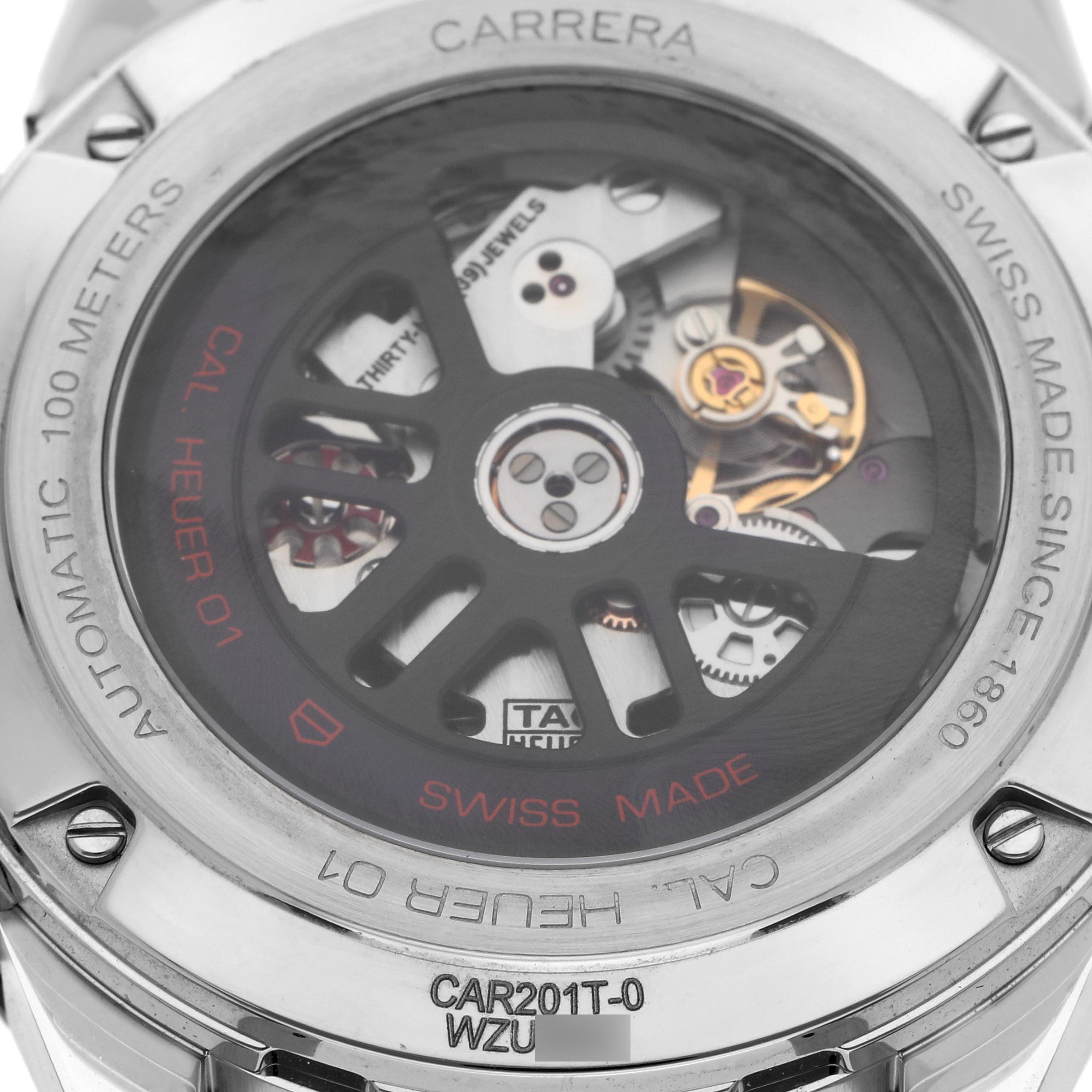 The image shows the back of a Tag Heuer Carrera CAR201T.BA0766 Men's Stainless Steel Blue Dial CAR201T.BA0766 Men's Stainless Steel Blue Dial watch, displaying its Calibre Heuer 01 movement through a transparent case back.