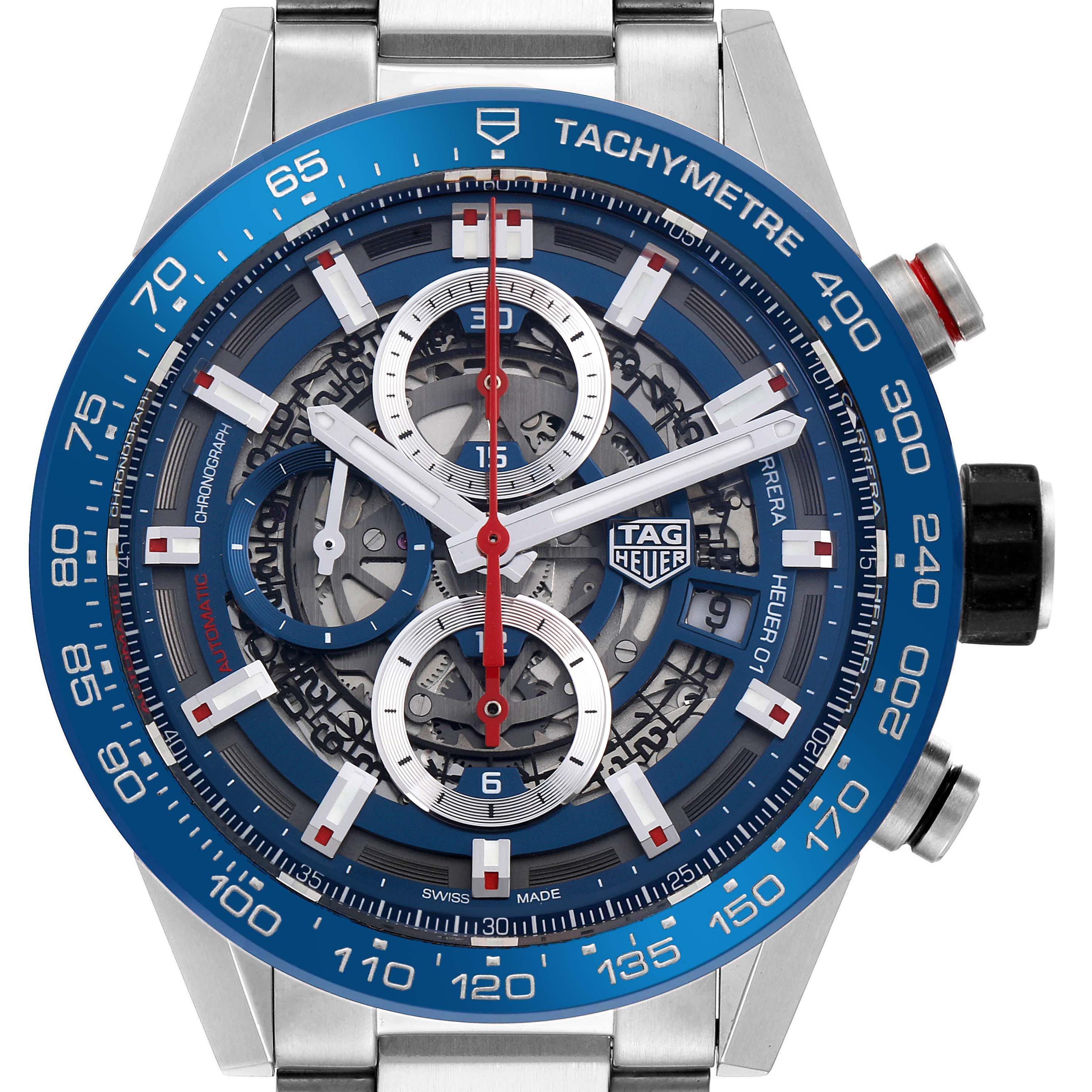 The Tag Heuer Carrera CAR201T.BA0766 Men's Stainless Steel Blue Dial CAR201T.BA0766 Men's Stainless Steel Blue Dial watch is shown from a front angle, highlighting its blue tachymeter bezel, skeleton dial, and chronograph subdials.