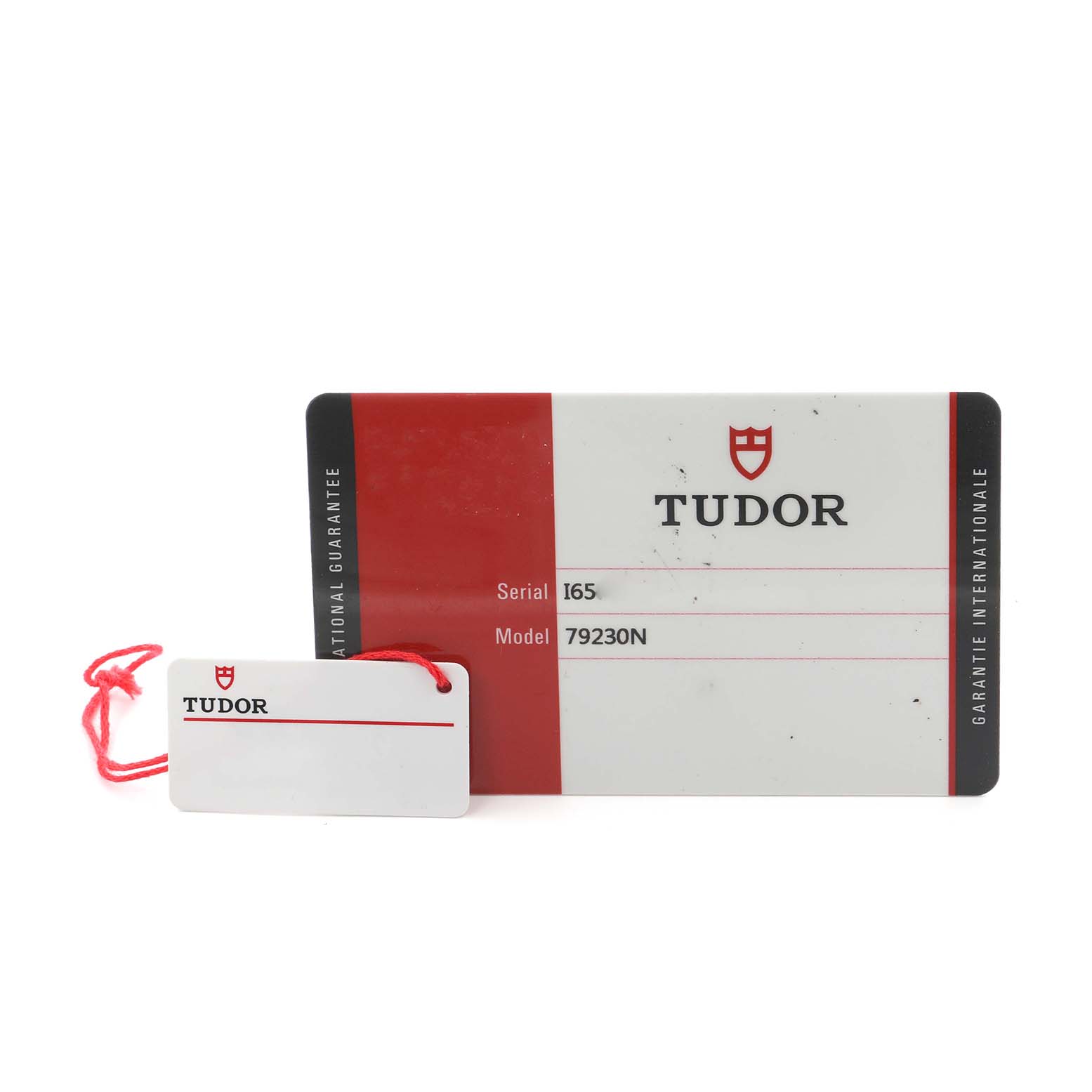 The image shows a Tudor Heritage Black Bay 79230N Men's Stainless Steel Black Dial 79230N Men's Stainless Steel Black Dial model 79230N warranty card and hang tag, viewed from the front.