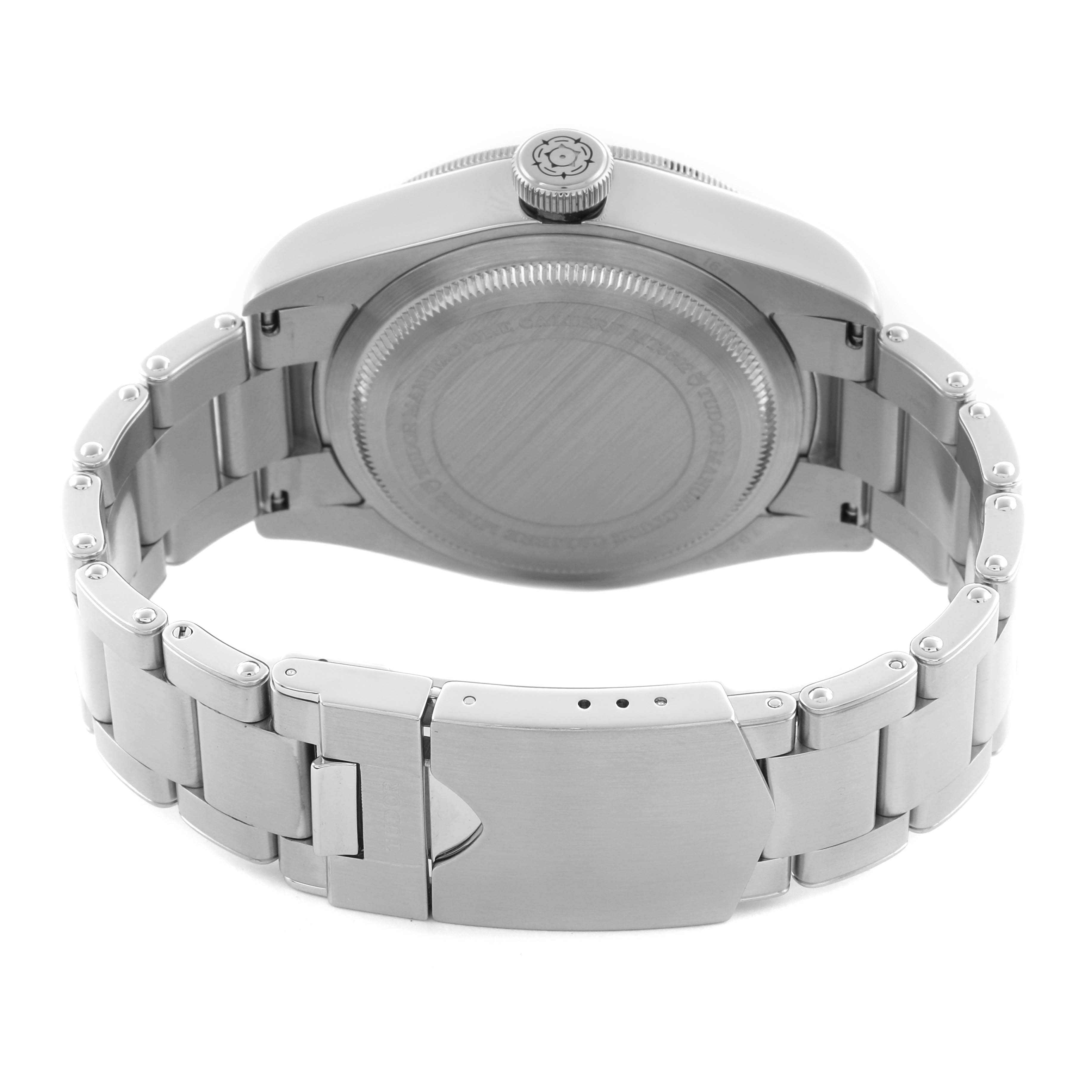 The image shows the back view of a Tudor Heritage Black Bay 79230N Men's Stainless Steel Black Dial 79230N Men's Stainless Steel Black Dial watch, highlighting the case back and metal bracelet with clasp.