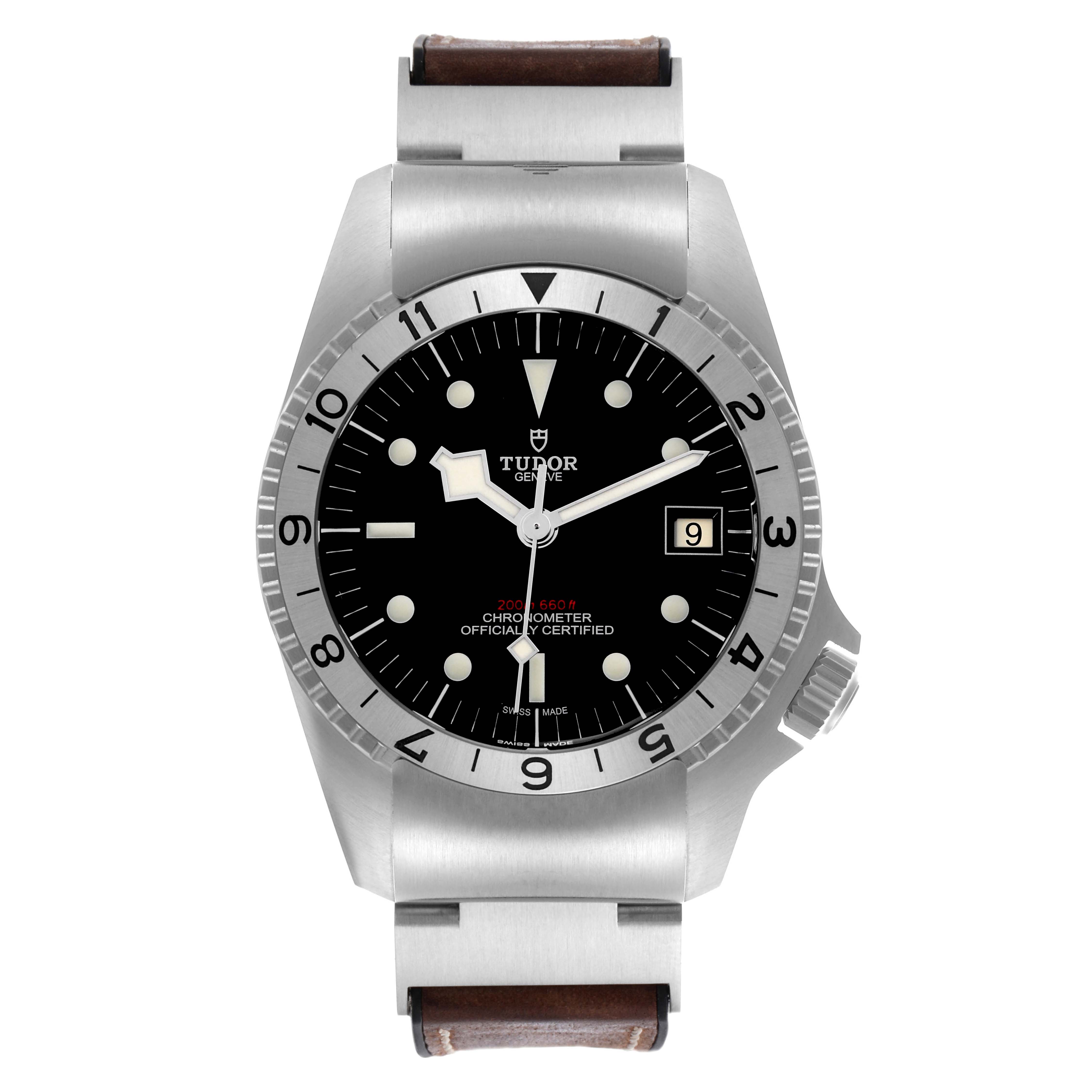 The Tudor Heritage Black Bay 70150 Men's Stainless Steel Black Dial 70150 Men's Stainless Steel Black Dial watch is shown from a front angle, highlighting its dial, bezel, and strap.
