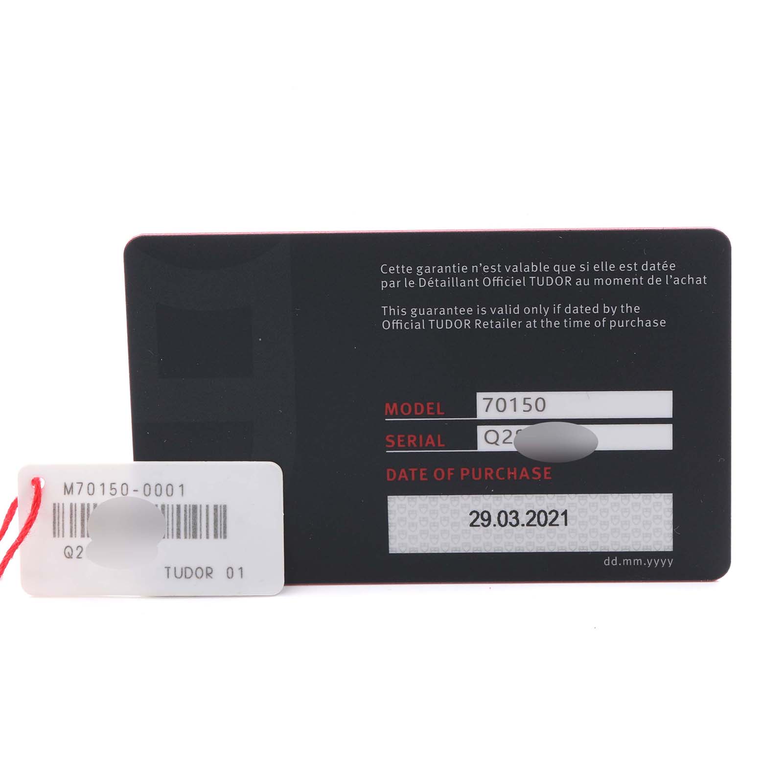 The image shows a Tudor Heritage Black Bay 70150 Men's Stainless Steel Black Dial 70150 Men's Stainless Steel Black Dial warranty card displaying model, serial number, and date of purchase.