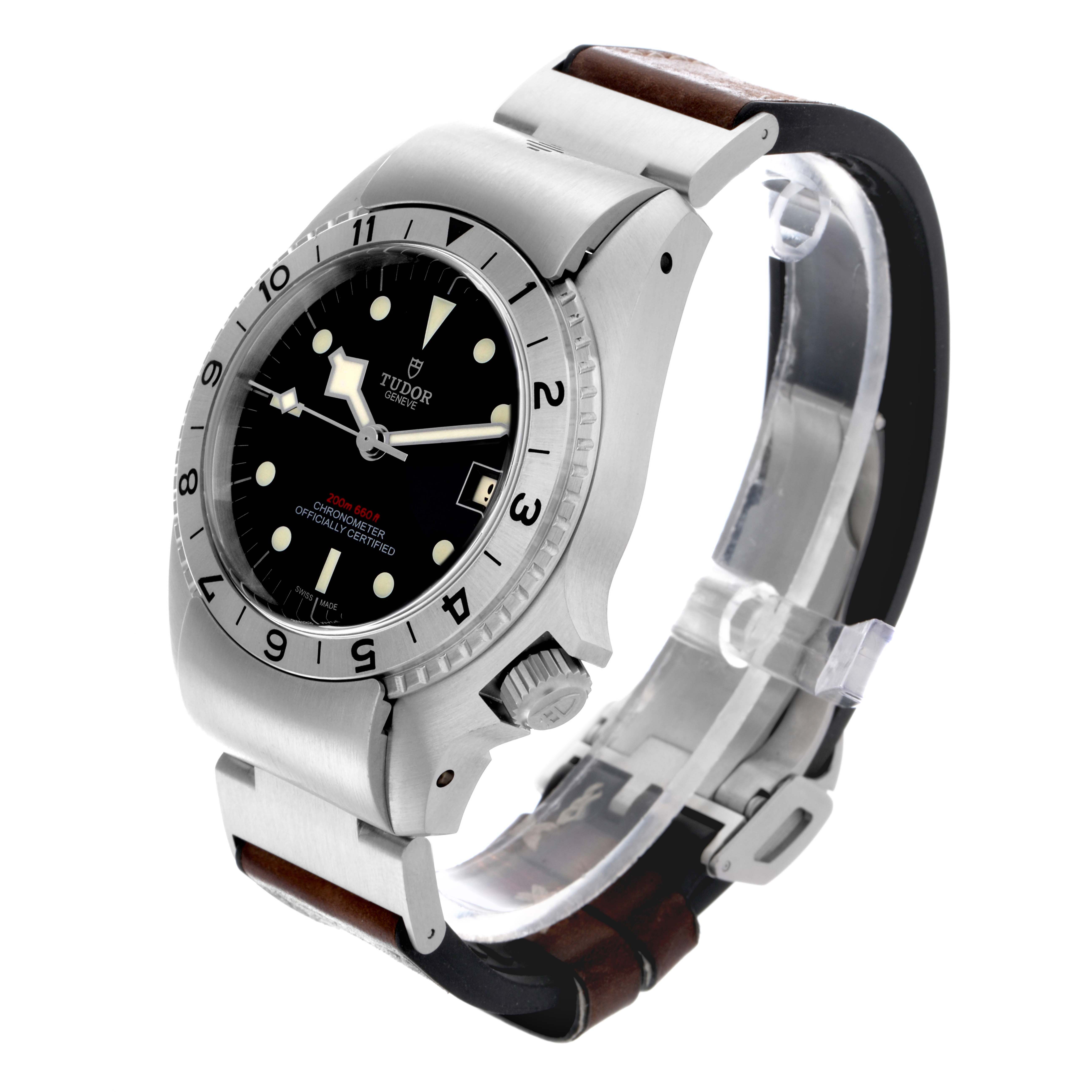 The Tudor Heritage Black Bay 70150 Men's Stainless Steel Black Dial 70150 Men's Stainless Steel Black Dial watch is shown at a side angle, displaying its bezel, dial, crown, and leather strap.