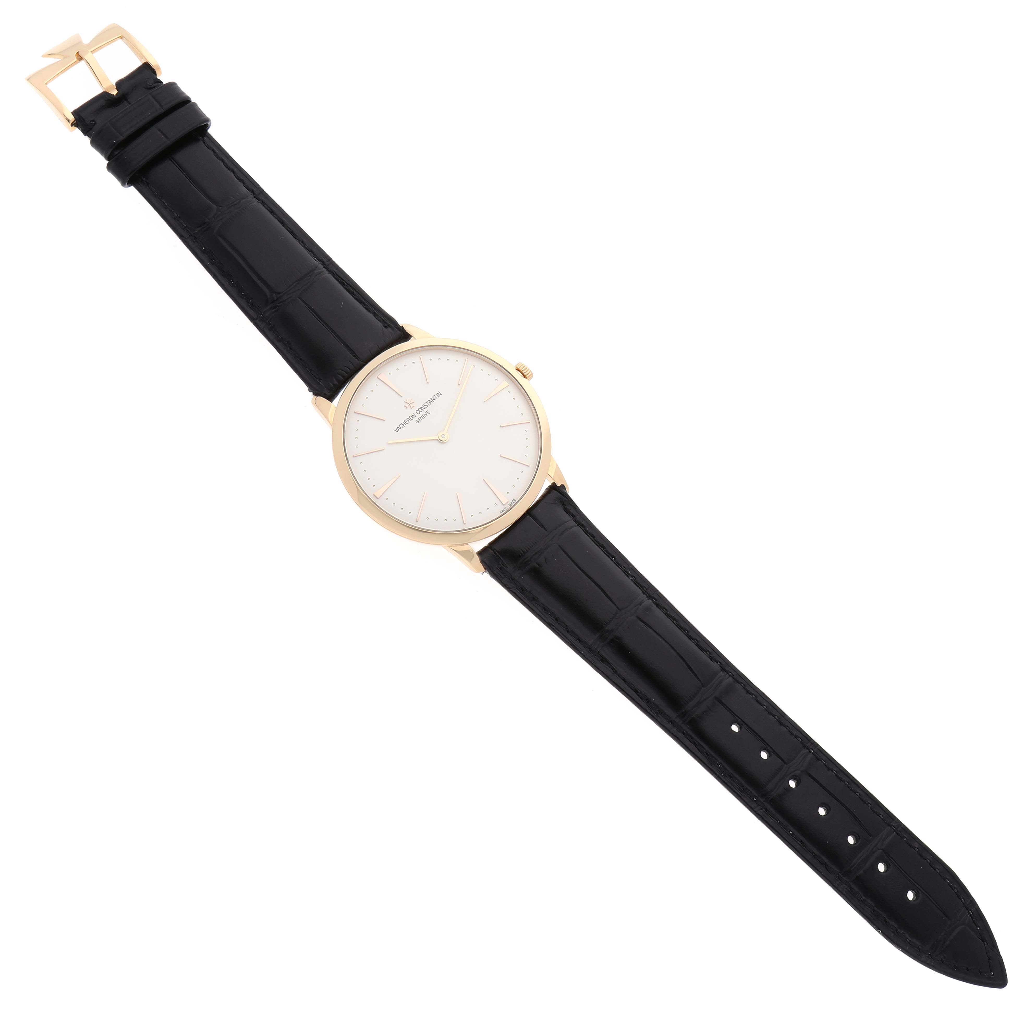 The image shows a Vacheron Constantin Patrimony 81180/000J Men's Yellow Gold Silver Dial 81180/000J Men's Yellow Gold Silver Dial watch, displayed from a top-down angle, highlighting its face, strap, and buckle.