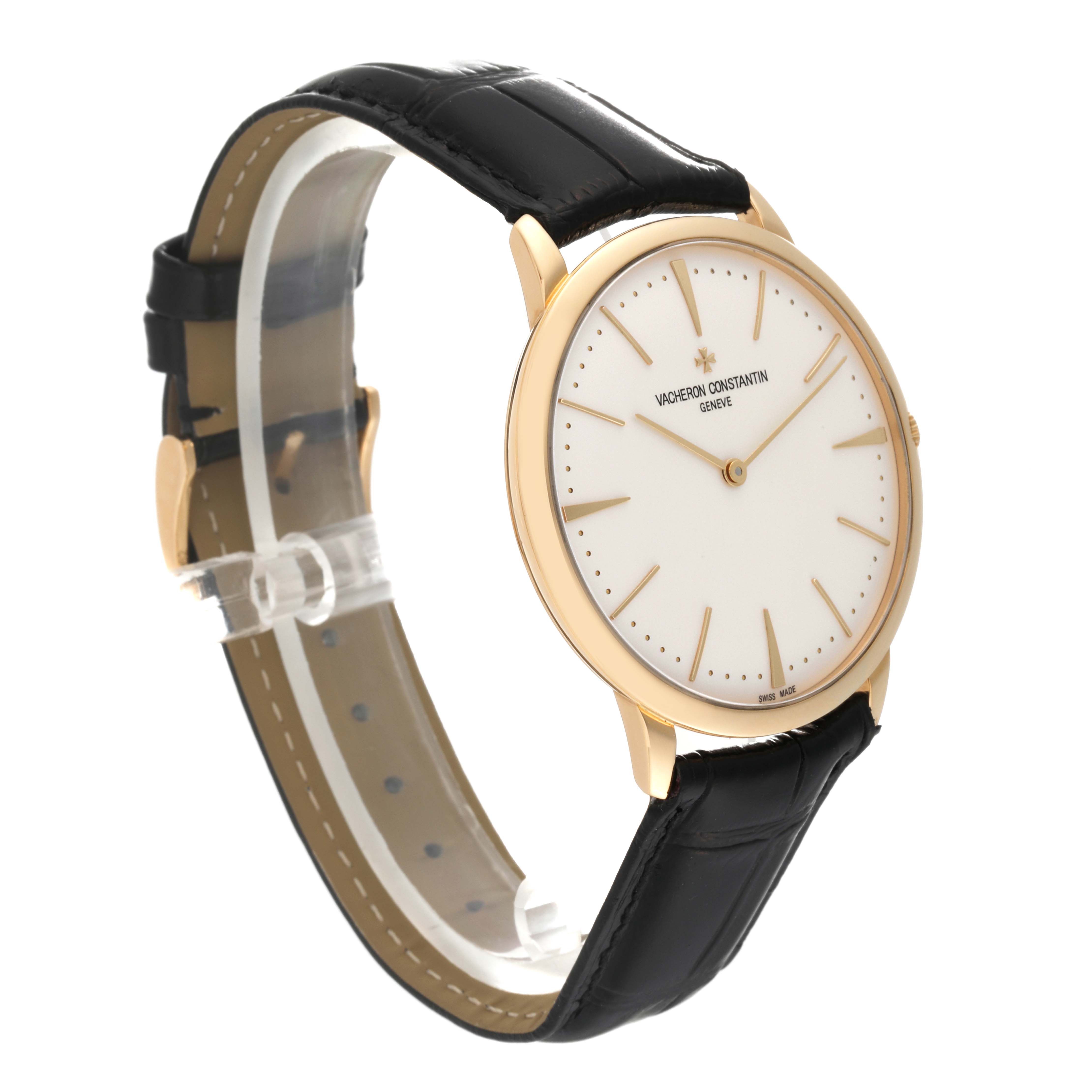 The image shows a side angle of a Vacheron Constantin Patrimony 81180/000J Men's Yellow Gold Silver Dial 81180/000J Men's Yellow Gold Silver Dial watch, highlighting its face, case, and leather strap.