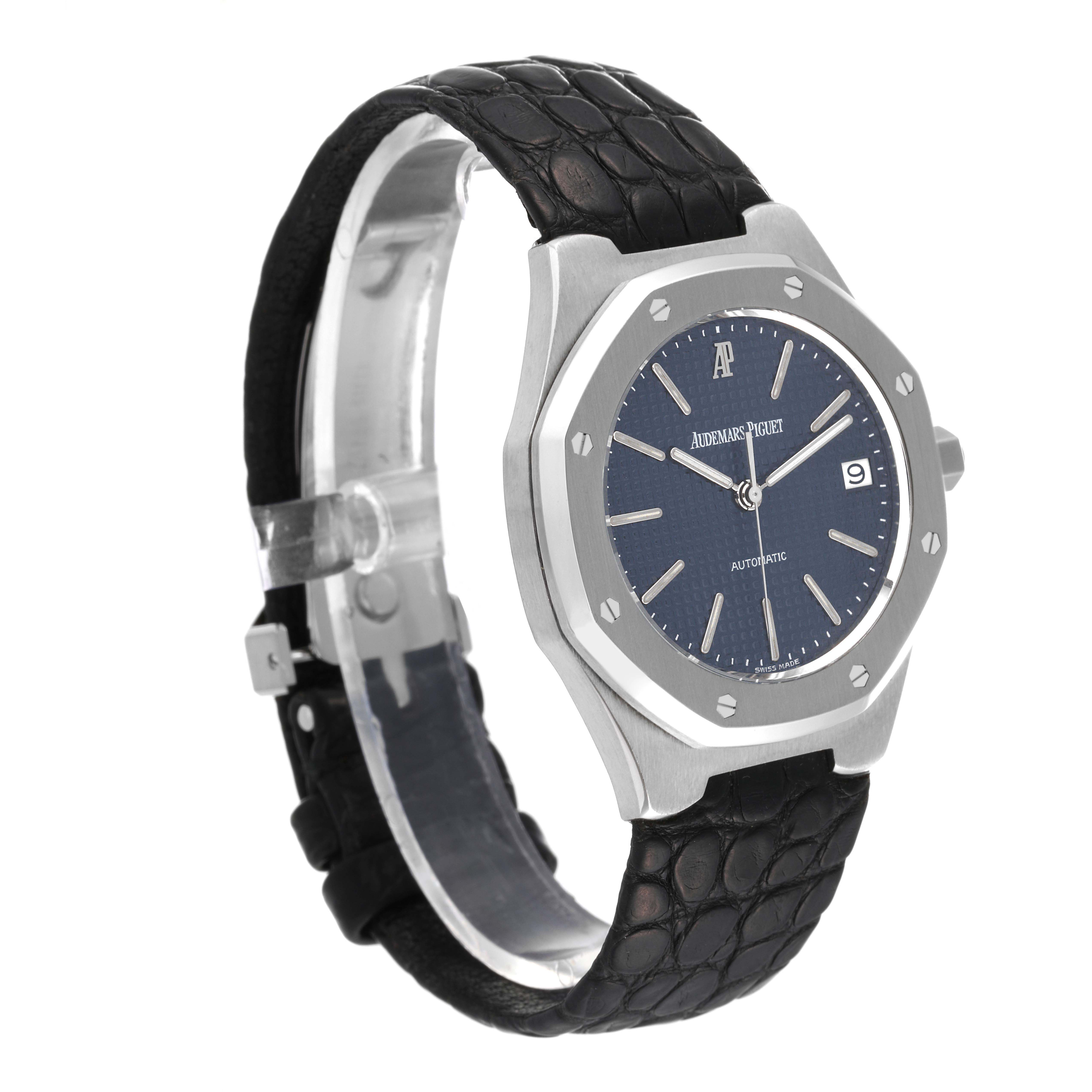 The image shows a side angle of the Audemars Piguet Royal Oak 14800ST Men's Stainless Steel Blue Dial 14800ST Men's Stainless Steel Blue Dial watch featuring its face, bezel, and full leather strap.
