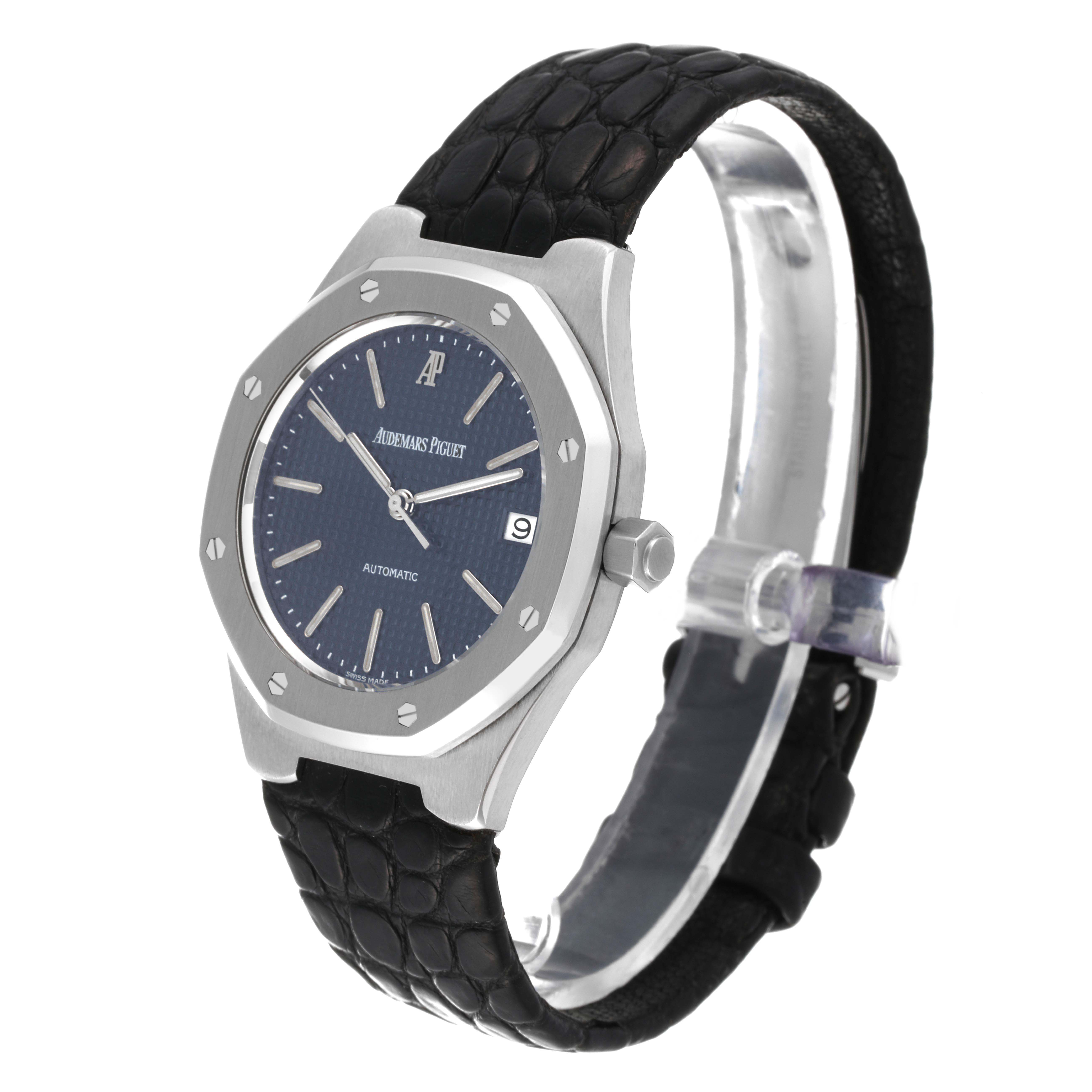 The image shows a side-angle view of the Audemars Piguet Royal Oak 14800ST Men's Stainless Steel Blue Dial 14800ST Men's Stainless Steel Blue Dial watch, featuring its distinctive octagonal bezel and black strap.