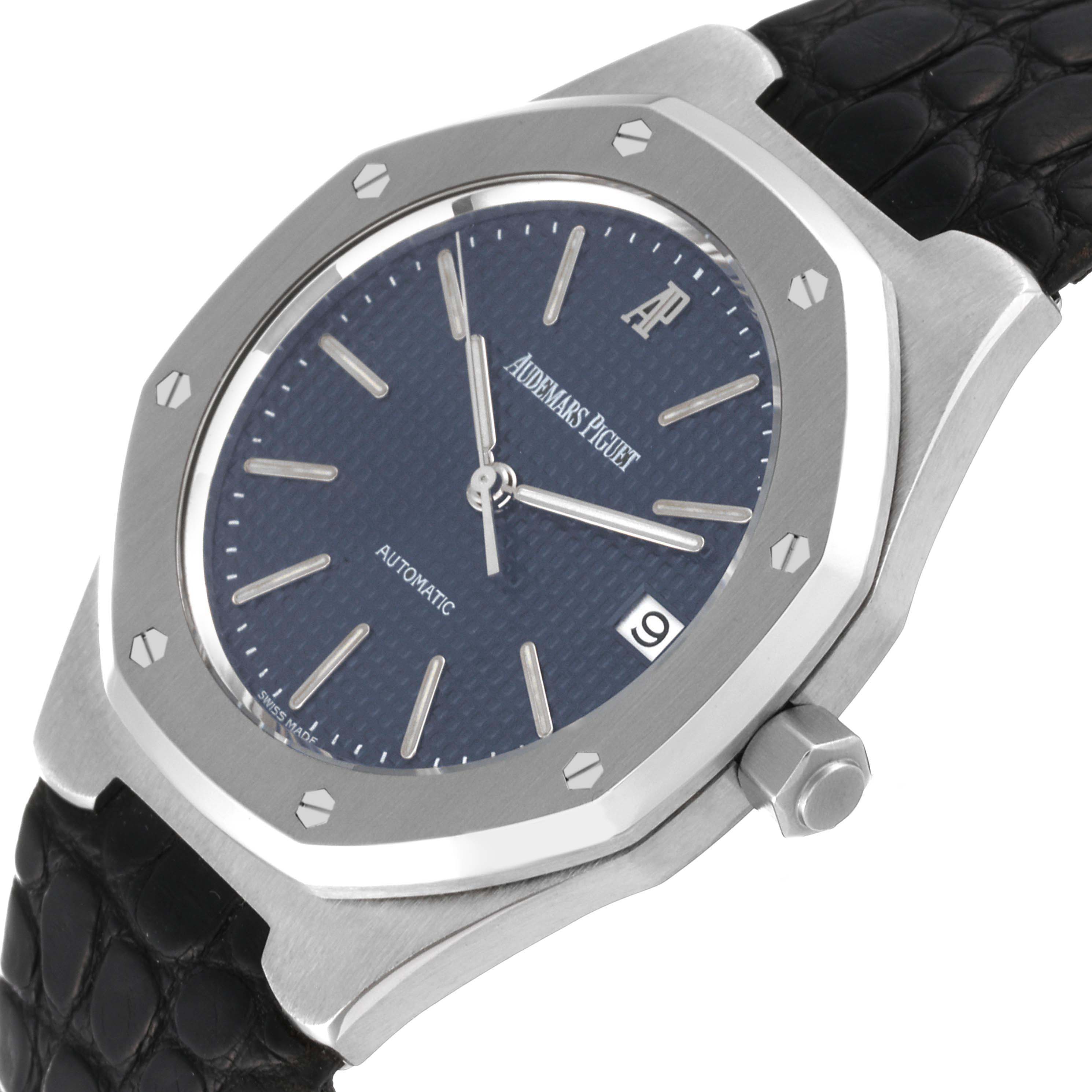 The image shows a top-side angle of the Audemars Piguet Royal Oak 14800ST Men's Stainless Steel Blue Dial 14800ST Men's Stainless Steel Blue Dial watch, highlighting the dial, bezel, crown, and strap.