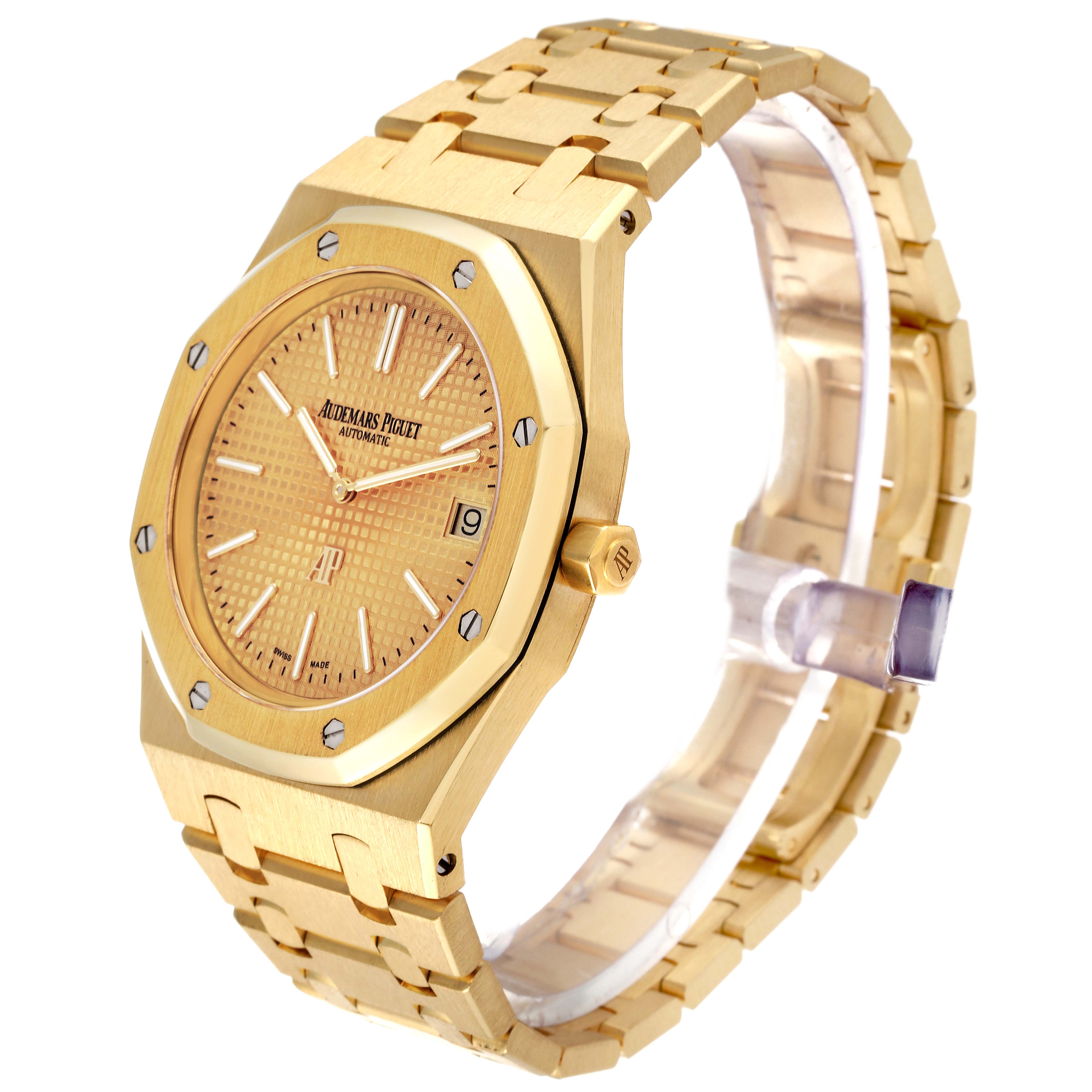This image shows a side angle of the Audemars Piguet Royal Oak 15202BA Men's Yellow Gold Champagne Dial 15202BA Men's Yellow Gold Champagne Dial watch, highlighting its octagonal bezel, dial, and bracelet.