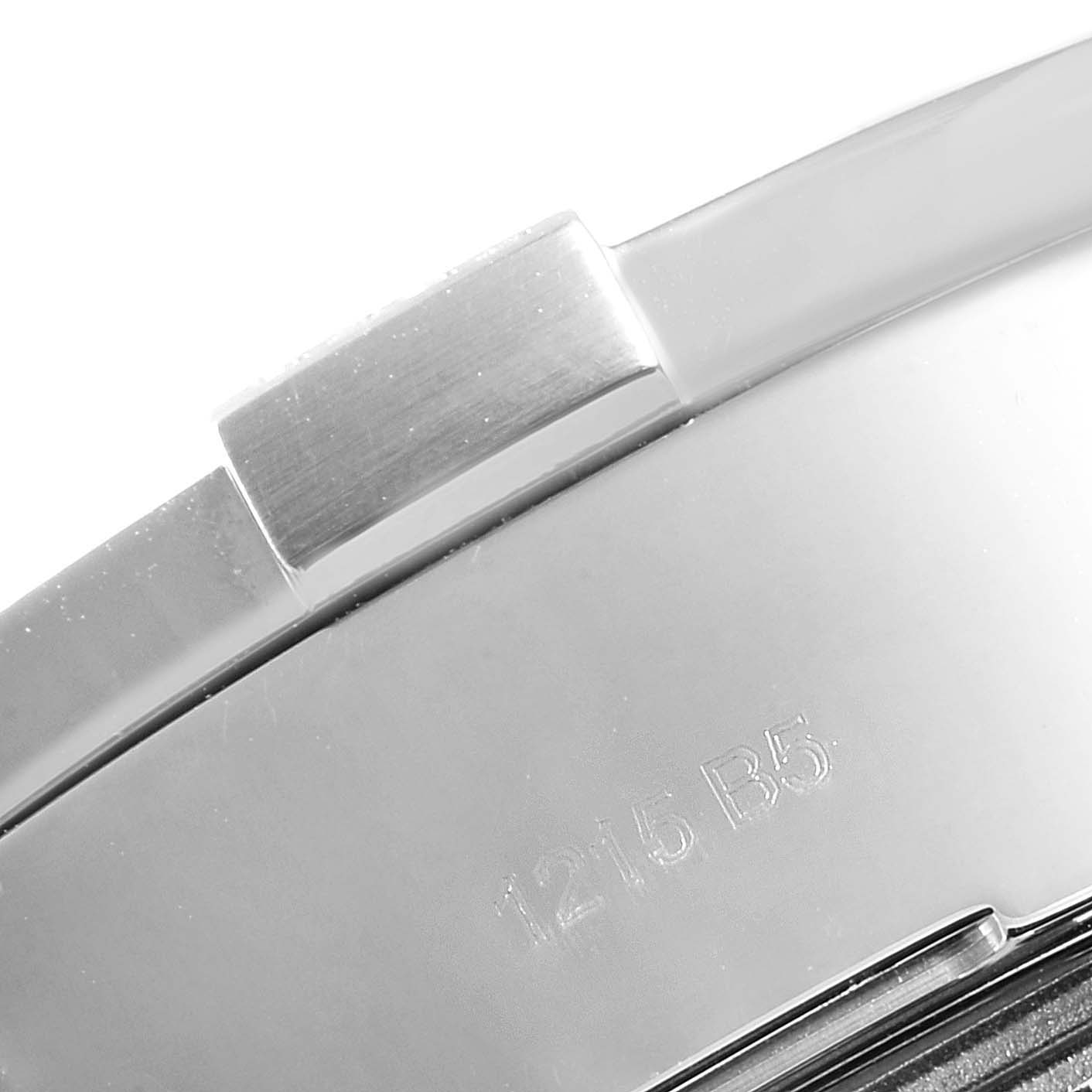 The image depicts a close-up of the clasp and engraved markings on the band of a Breitling Avenger A13371 Men
s Stainless Steel Black Dial A13371 Men
s Stainless Steel Black Dial watch.