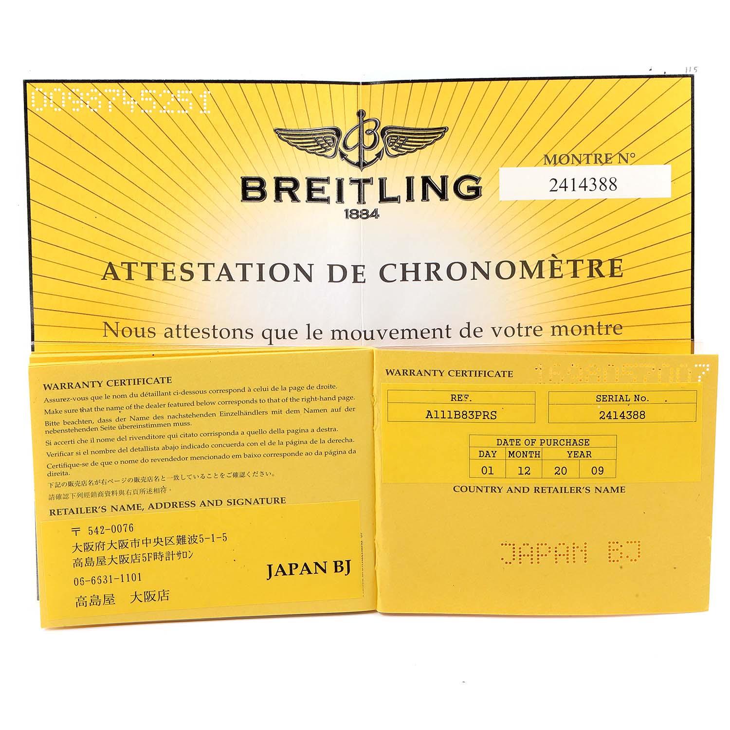 This image displays the Superocean model Breitling warranty card and chronometer certification.