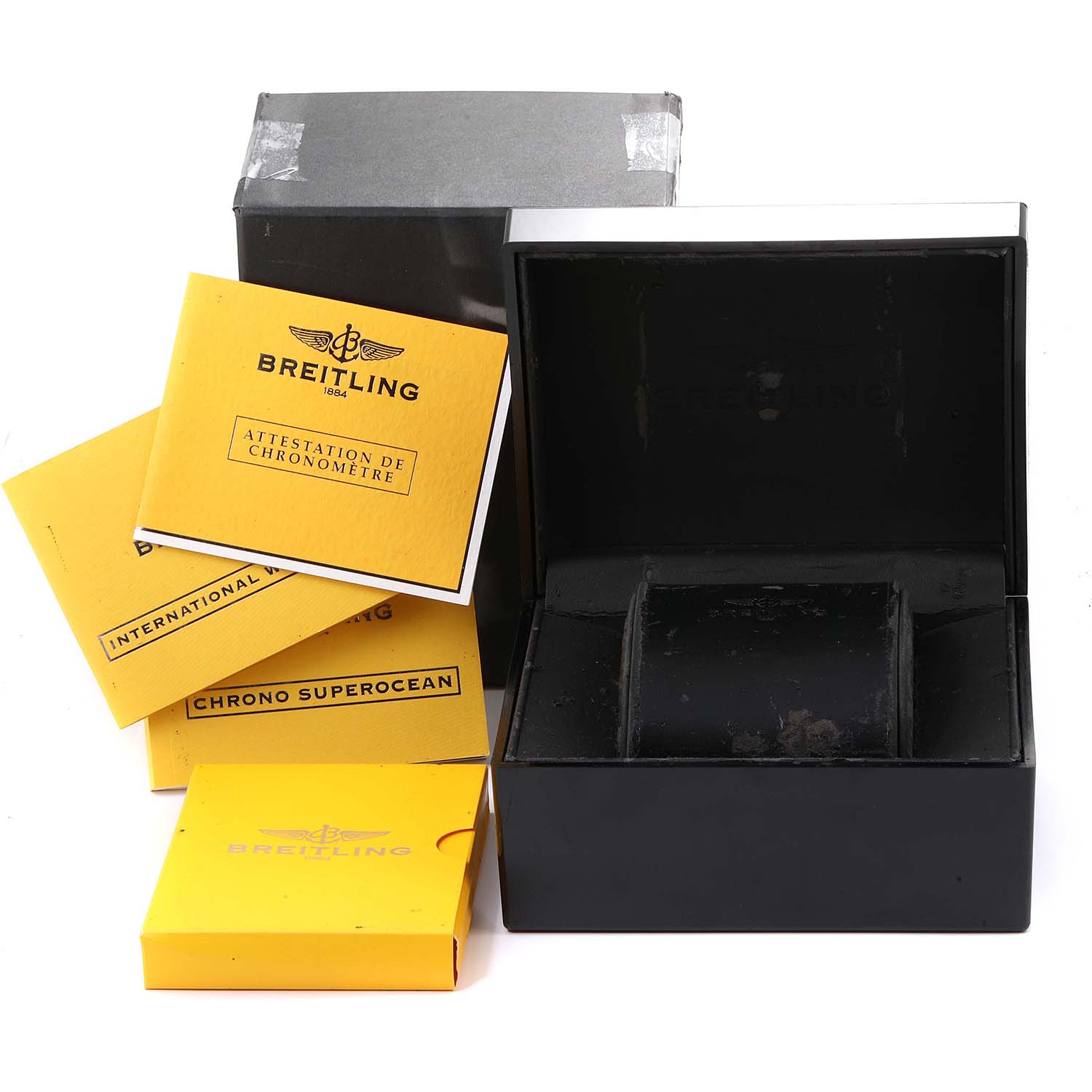 The image shows the open box and manuals for the Breitling Superocean A13340 Men's Stainless Steel Black Dial A13340 Men's Stainless Steel Black Dial watch.