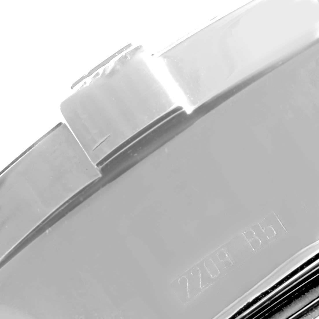 This close-up image of the Breitling Superocean A13340 Men's Stainless Steel Black Dial A13340 Men's Stainless Steel Black Dial watch shows the side of the case and part of the bracelet clasp.