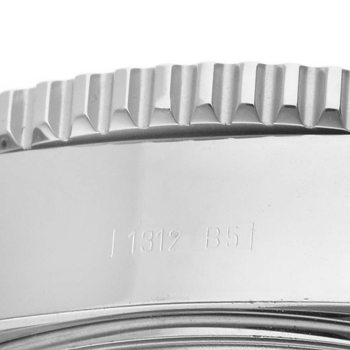 The image shows a close-up of the side view of the bezel and part of the case of a Breitling Superocean A13341 Men's Stainless Steel Black Dial A13341 Men's Stainless Steel Black Dial watch.