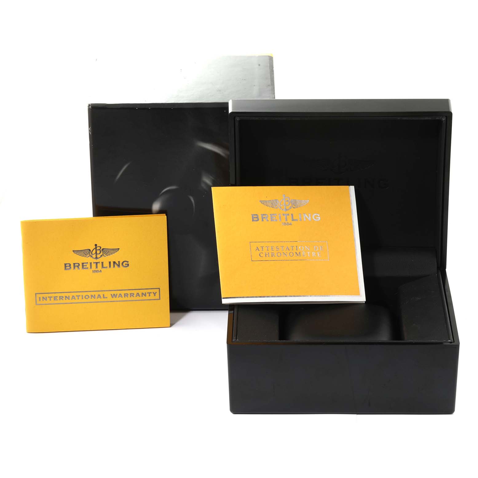 The image shows the packaging and documentation for a Breitling Superocean A111G49PRS Men's Stainless Steel Silver Dial A111G49PRS Men's Stainless Steel Silver Dial watch, including the warranty and chronometer certificate.