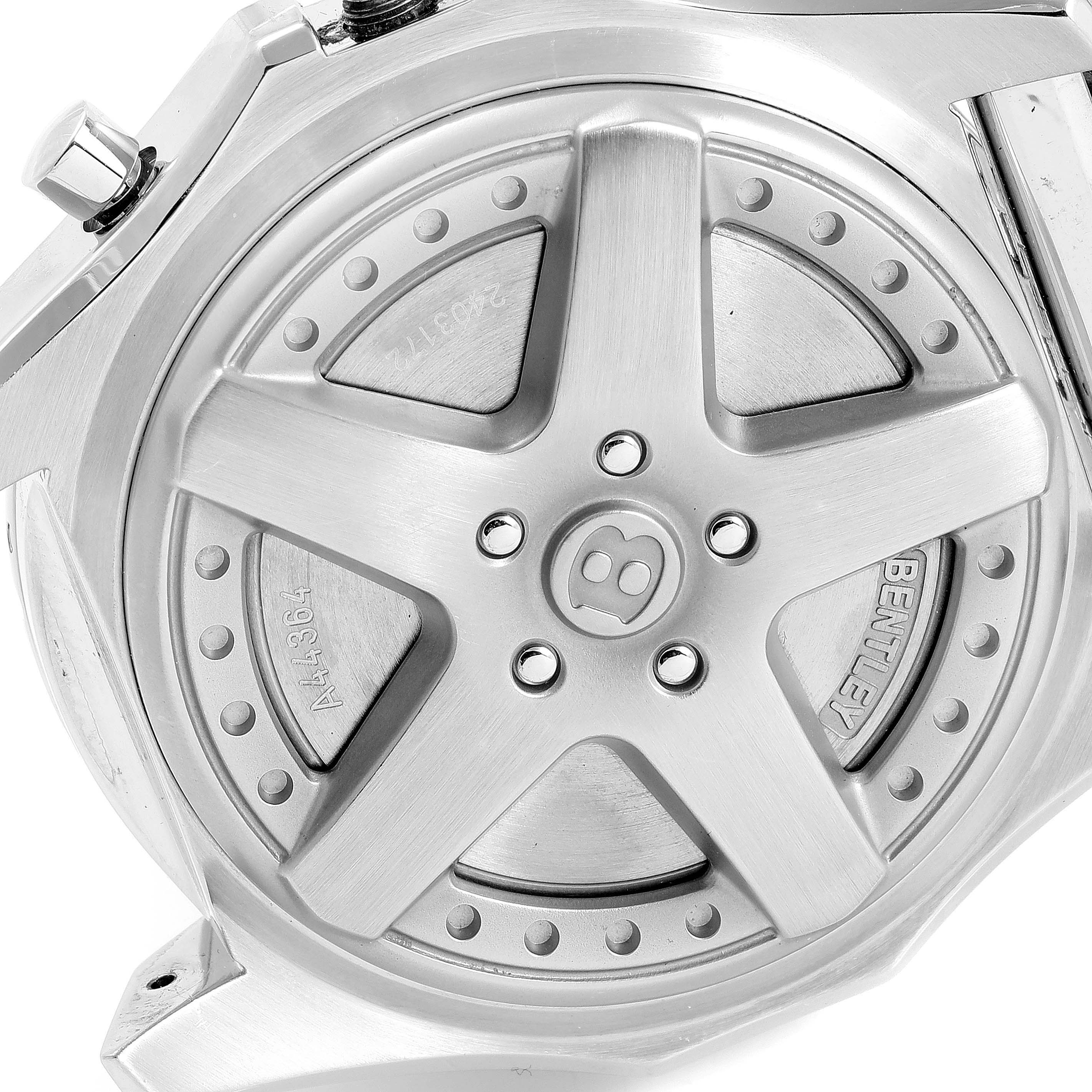 This image shows the back case of a Bentley model watch by Breitling, featuring a car wheel design.