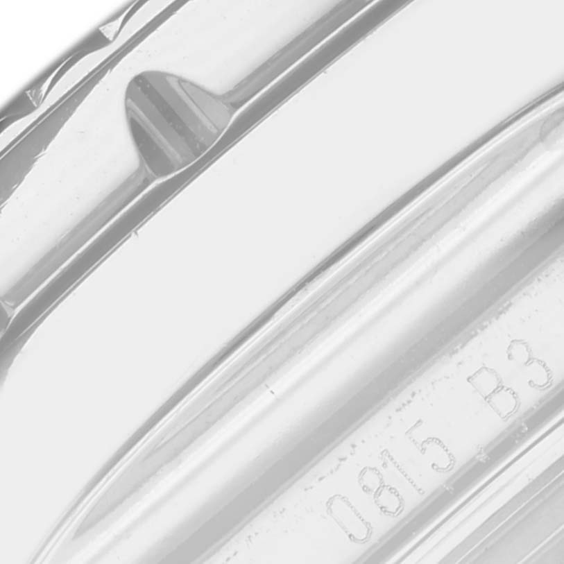 A close-up angle of the Breitling Bentley AB061221/G810 Men's Stainless Steel Silver Dial AB061221/G810 Men's Stainless Steel Silver Dial model watch, showing part of the bezel and the serial number.