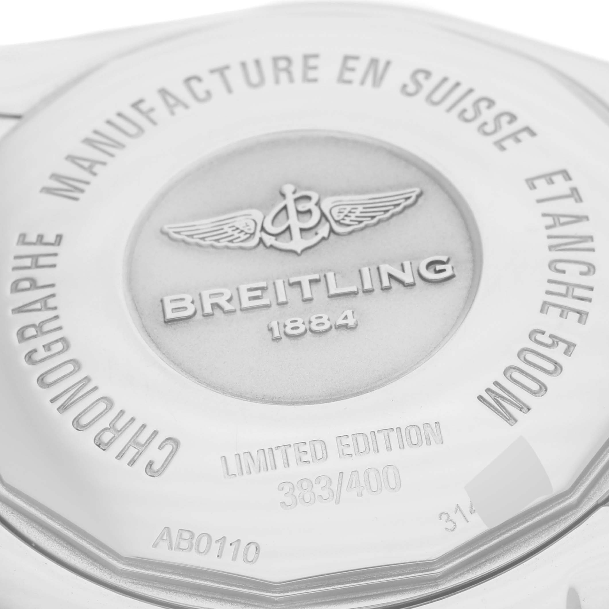 The image shows the back case of a Breitling Chronomat AB01103C/BC48 Men's Stainless Steel Mother of Pearl Dial AB01103C/BC48 Men's Stainless Steel Mother of Pearl Dial watch, highlighting the engraving and branding details.