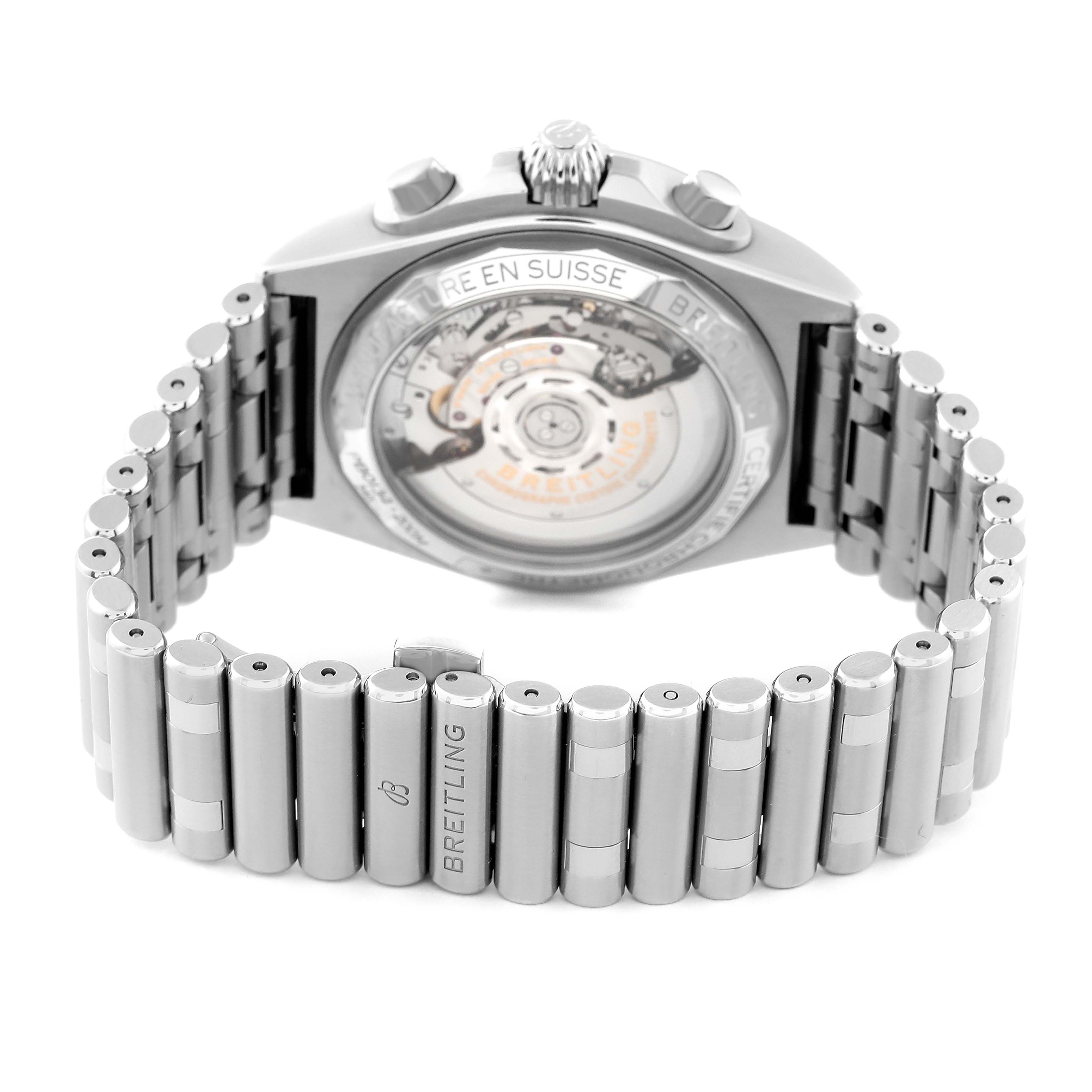 This image shows the back view of the Breitling Chronomat PB0134101C1S1 Men's Stainless Steel Blue Dial PB0134101C1S1 Men's Stainless Steel Blue Dial, highlighting its metal bracelet and the transparent case back displaying the movement.