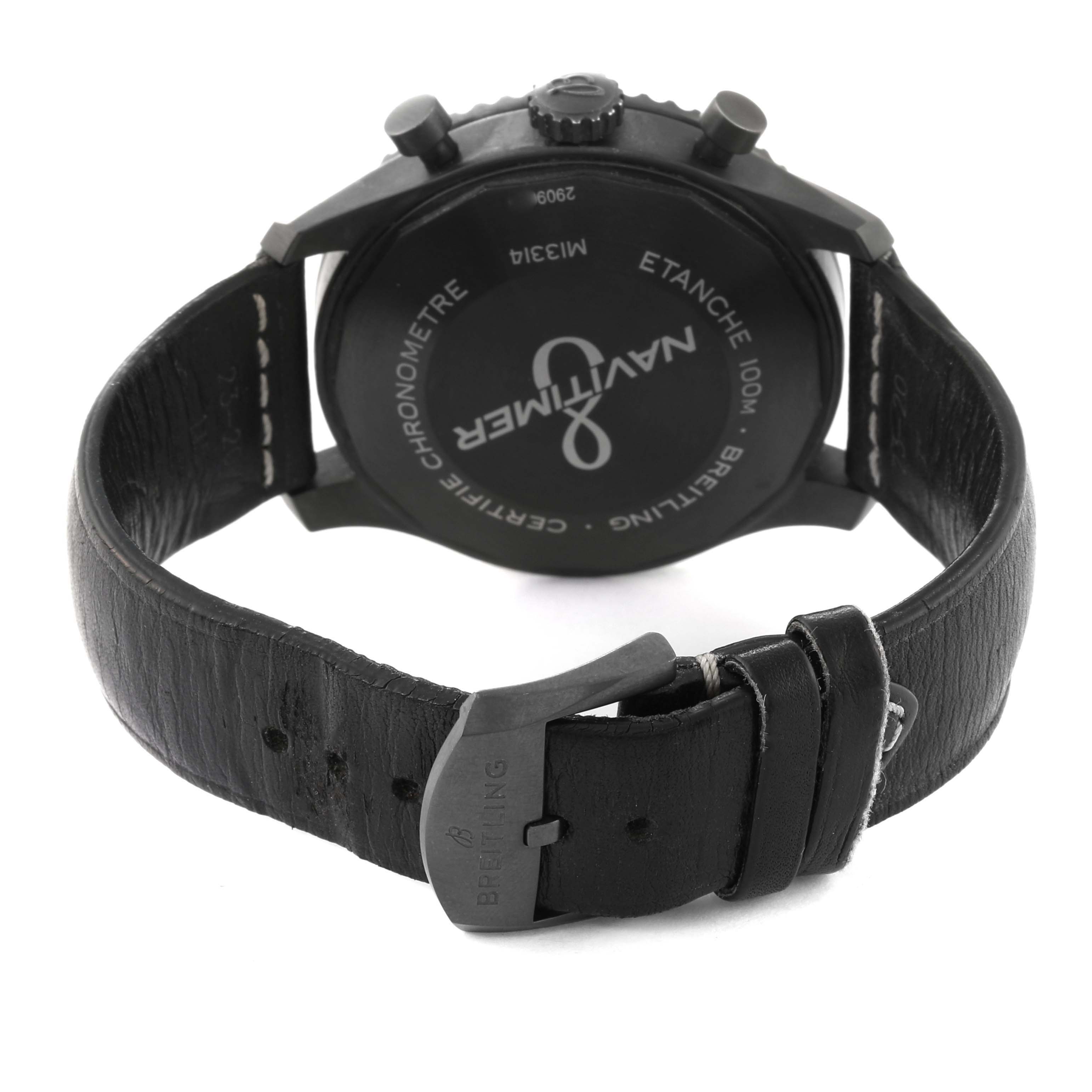 The image shows the backside of a Breitling Navitimer M13314101B1X1 Men's Stainless Steel Black Dial M13314101B1X1 Men's Stainless Steel Black Dial watch, focusing on the case back, strap, and buckle.