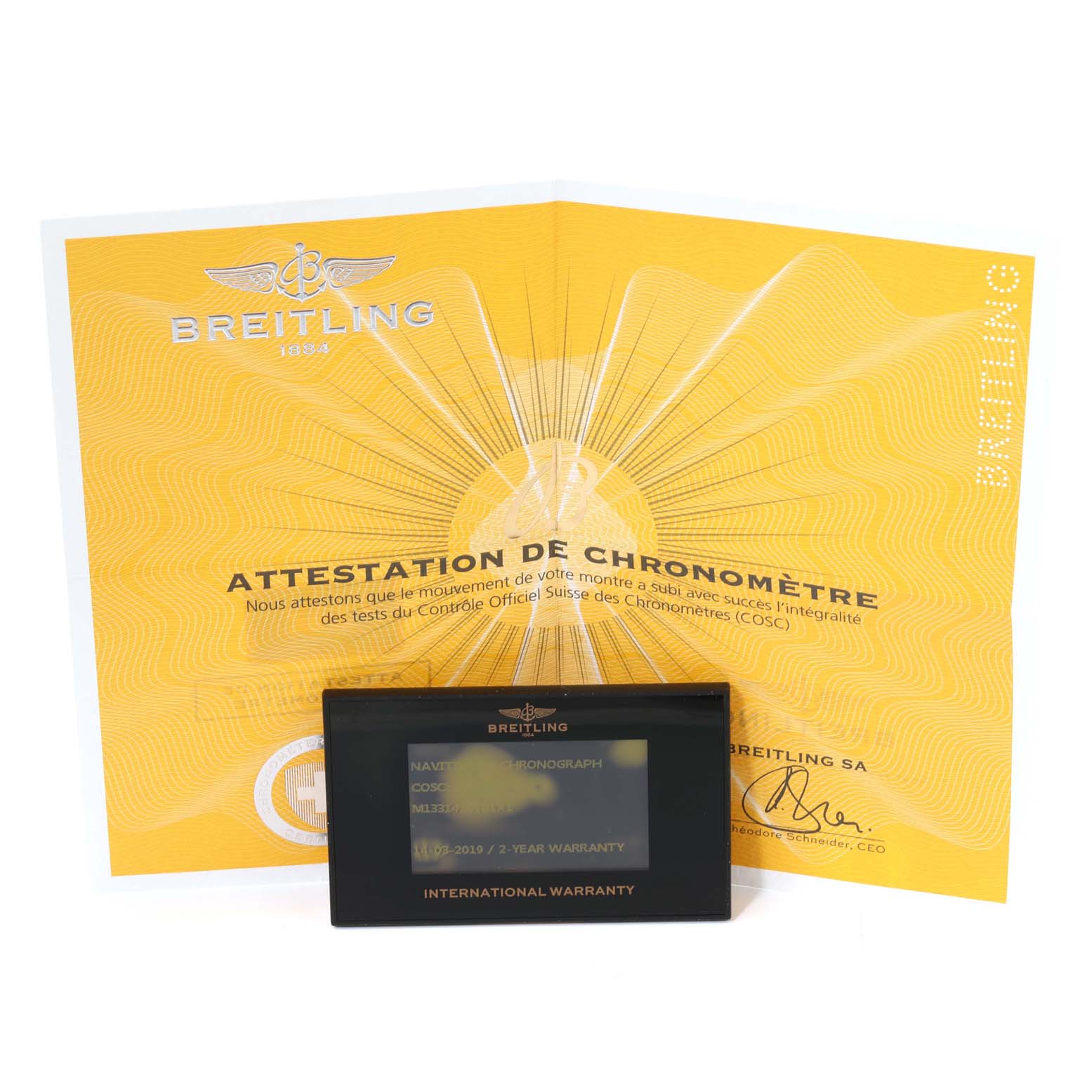 The image shows the warranty card and certificate of the Navitimer model by Breitling, viewed from the front.