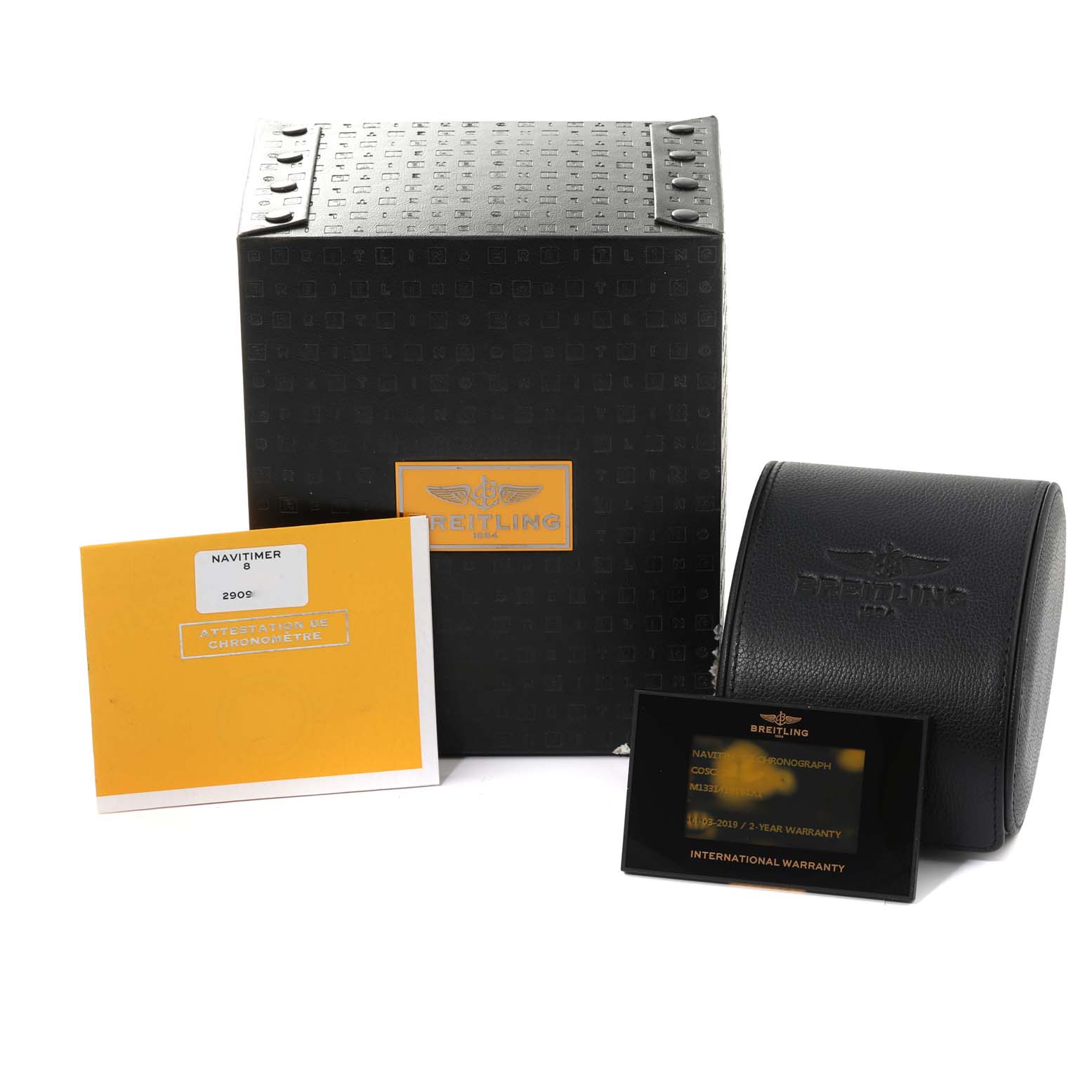 The image shows the packaging, warranty card, and instructions for a Breitling Navitimer M13314101B1X1 Men's Stainless Steel Black Dial M13314101B1X1 Men's Stainless Steel Black Dial watch.