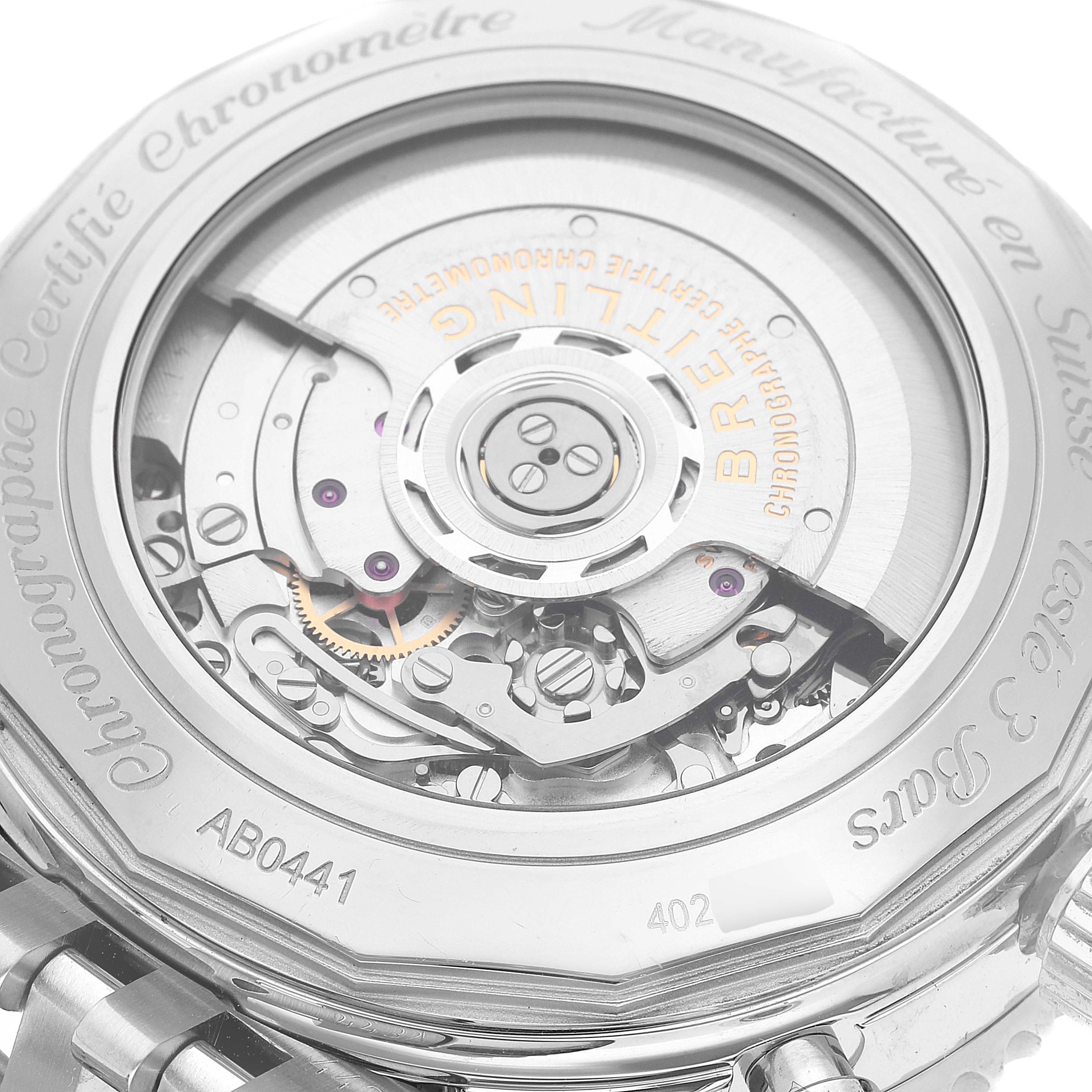 The image shows the back view of a Breitling Navitimer AB0441 Men's Stainless Steel Silver Dial AB0441 Men's Stainless Steel Silver Dial watch, focusing on its intricate movement parts and mechanisms.