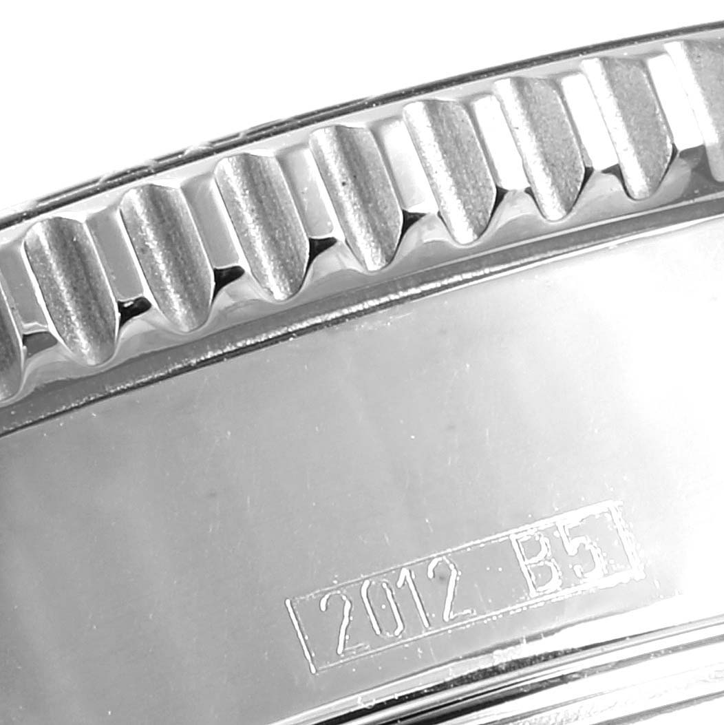 This image shows a close-up of the bezel and engraved serial number on a Breitling Superocean A17364 Men's Stainless Steel Black Dial A17364 Men's Stainless Steel Black Dial watch.