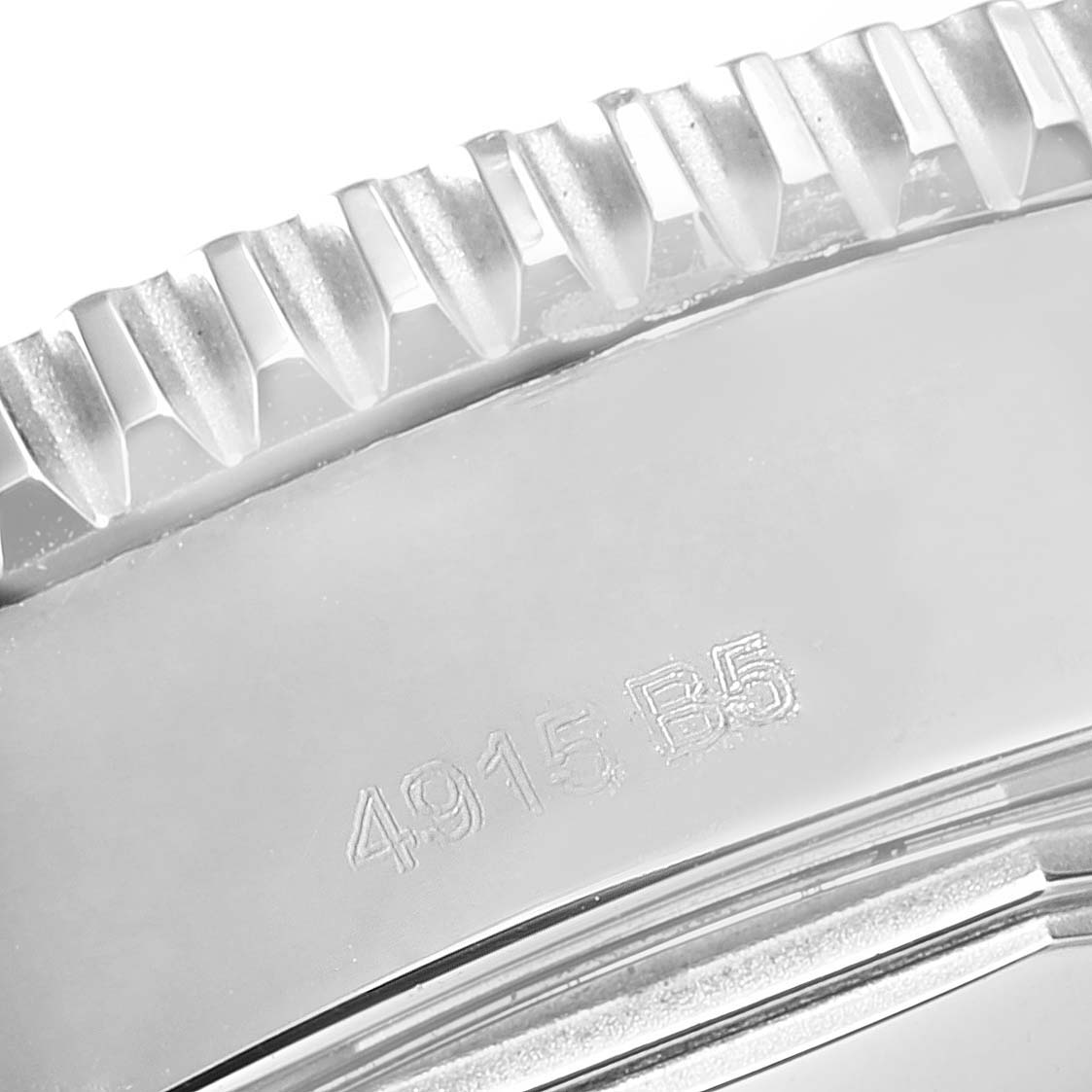 The image shows a close-up of the bezel and case side of the Breitling Superocean A17365 Men's Stainless Steel Black Dial A17365 Men's Stainless Steel Black Dial watch, with engraving visible.