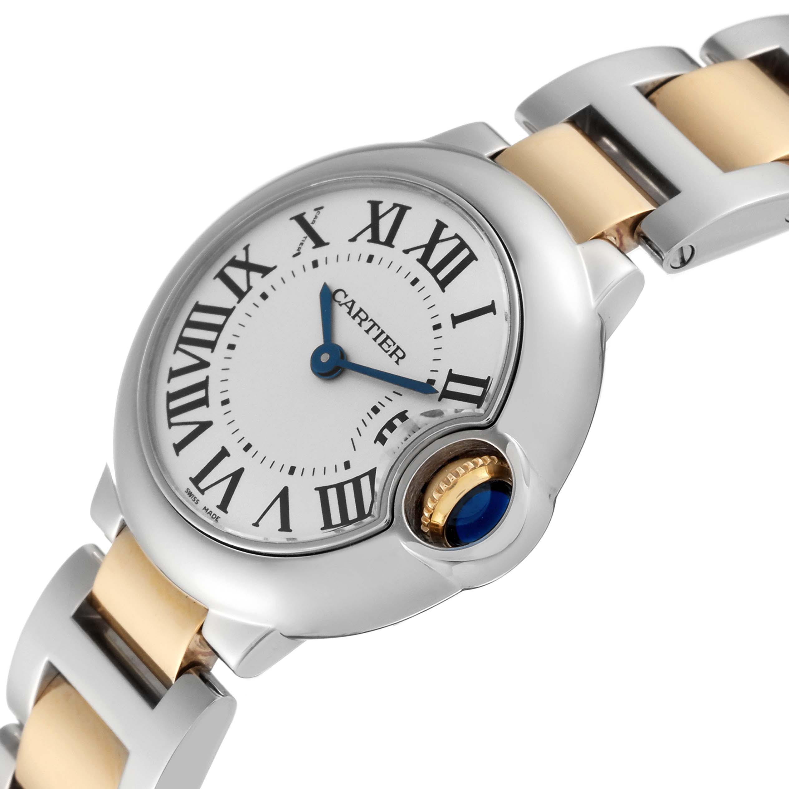 The image shows a close-up view of the Ballon Bleu de Cartier watch, highlighting its round face, Roman numerals, and distinct crown with a blue cabochon.