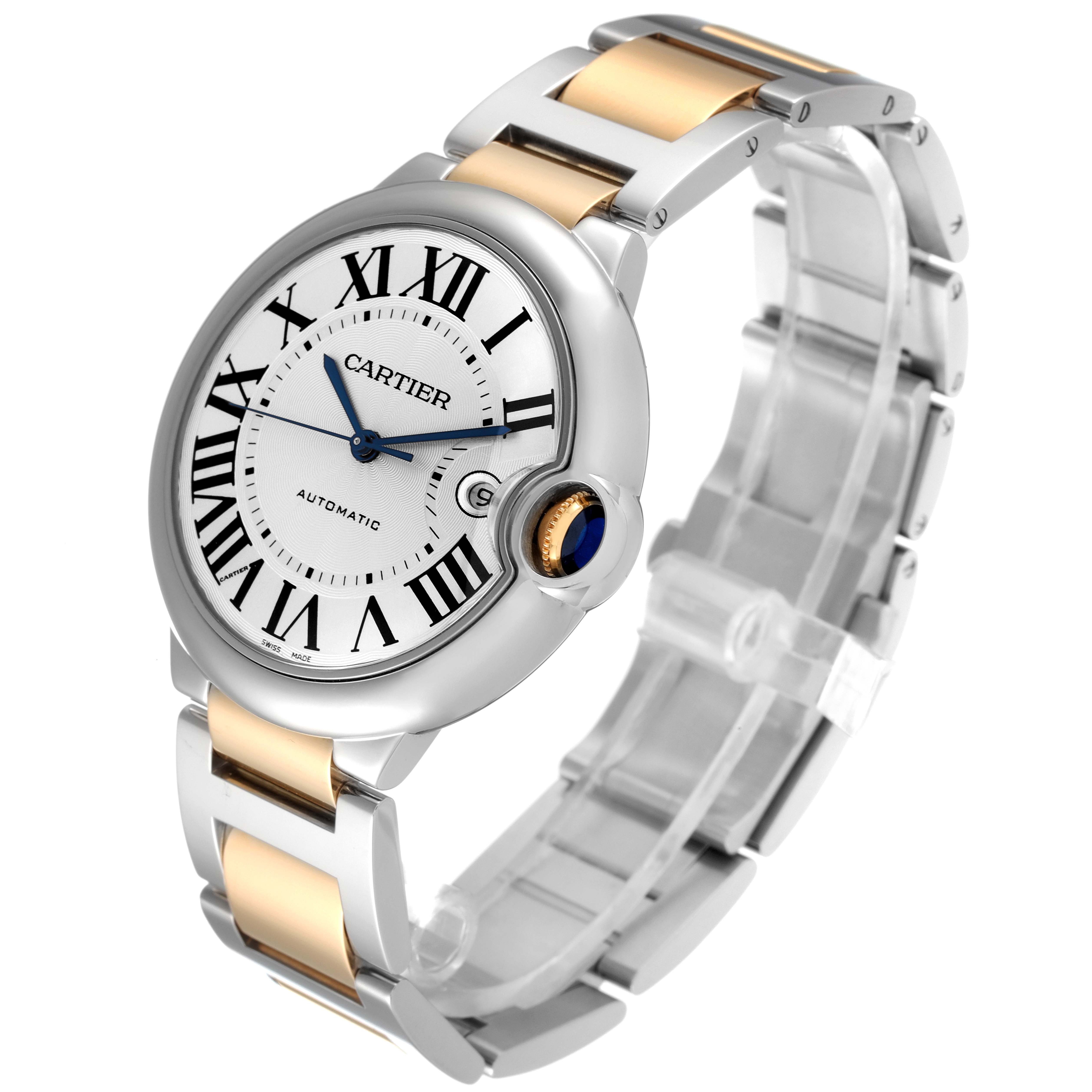 The image shows a Cartier Ballon Bleu W6900923 Men's Steel and Gold (two tone) Silver Dial W6900923 Men's Steel and Gold (two tone) Silver Dial watch at a three-quarter angle, highlighting its dial and two-tone bracelet.