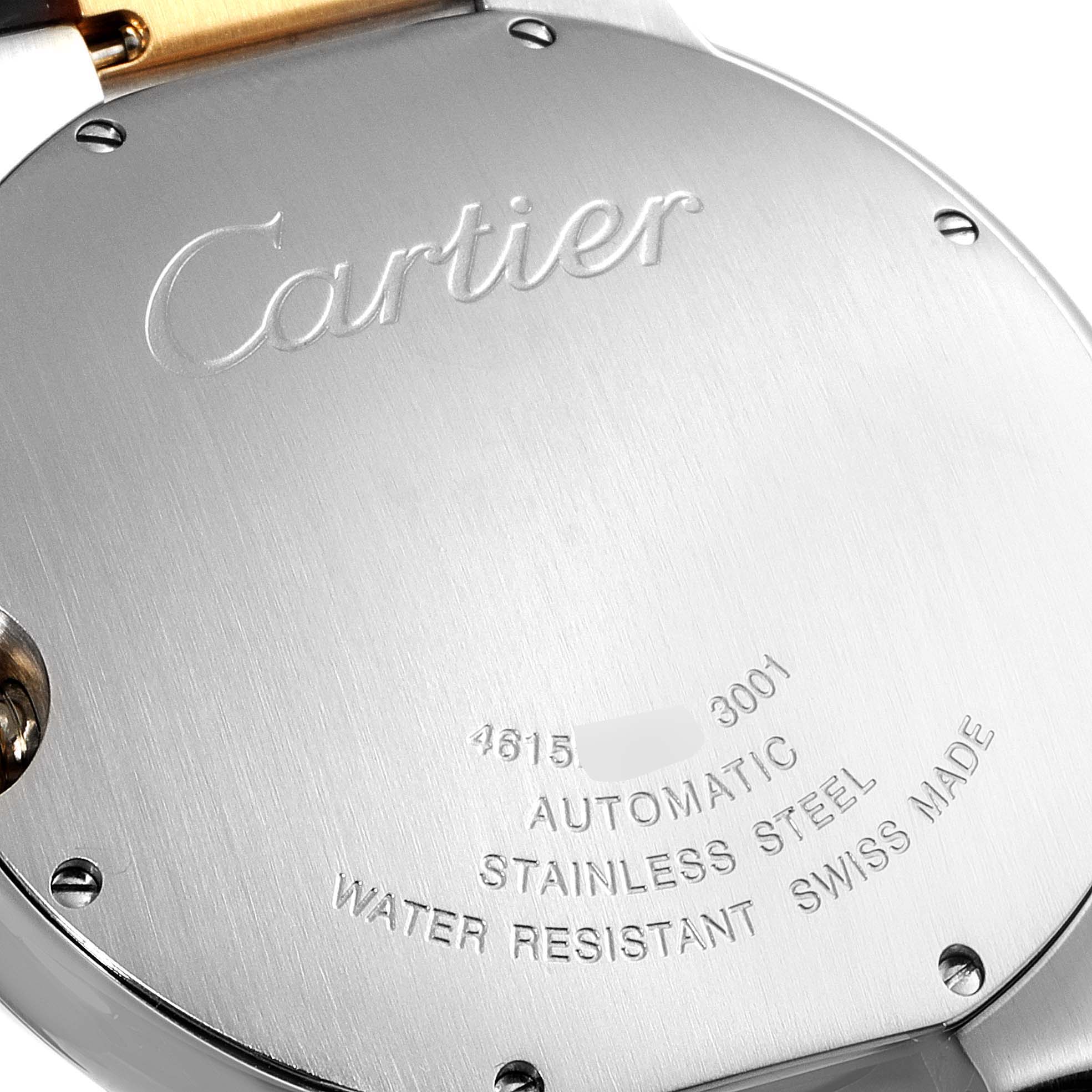 The image shows the back of the Ballon Bleu de Cartier watch, displaying the brand's engraving and model specifications.